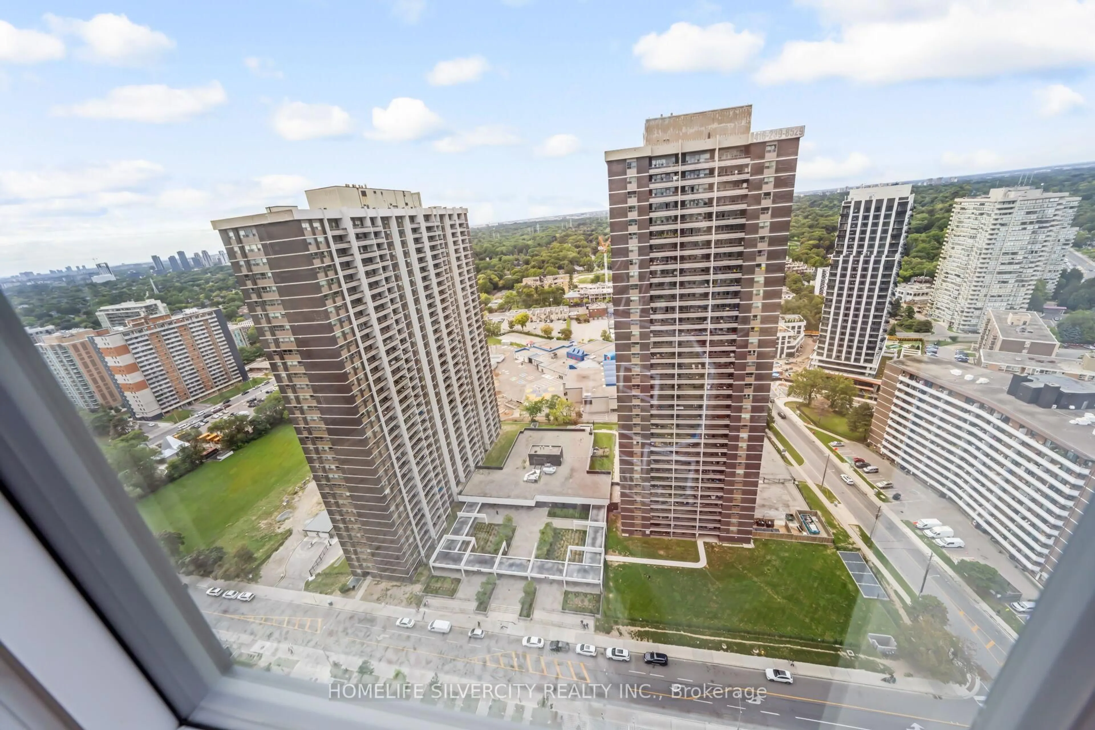 A pic from outside/outdoor area/front of a property/back of a property/a pic from drone, city buildings view from balcony for 7 Mabelle Ave #3104, Toronto Ontario M9A 0C9