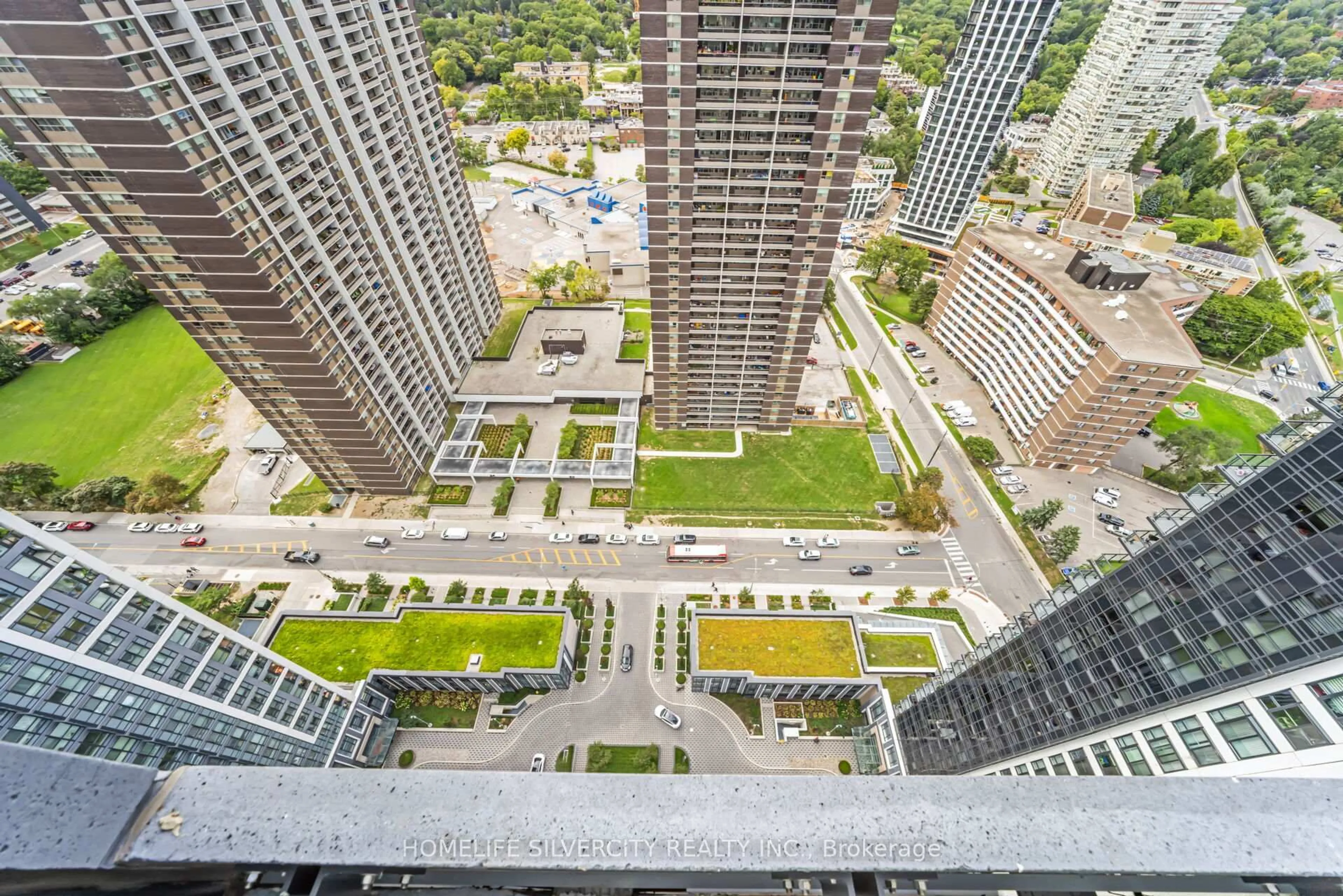 Patio, city buildings view from balcony for 7 Mabelle Ave #3104, Toronto Ontario M9A 0C9