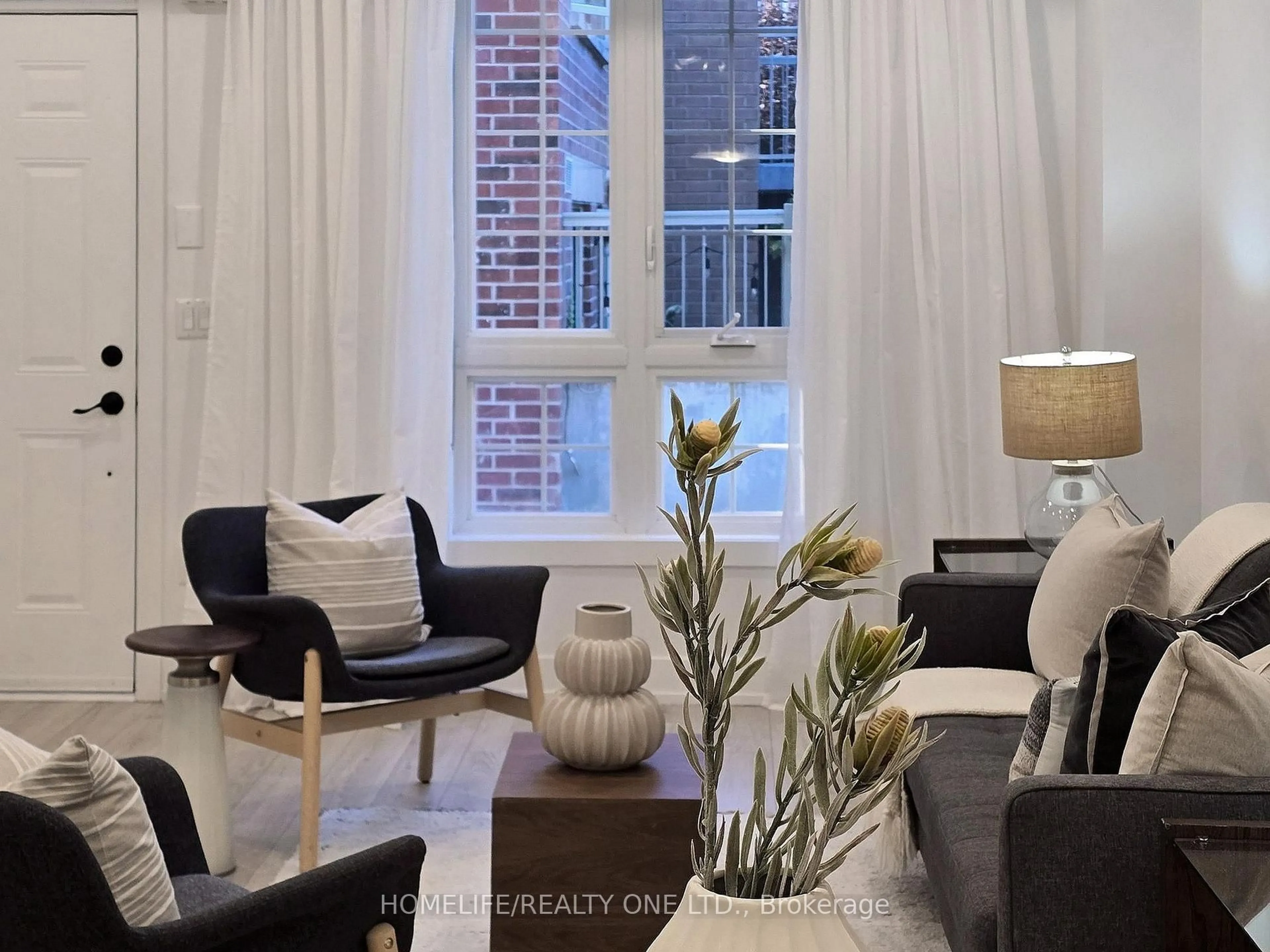 Living room with furniture, unknown for 3 Elsie Lane #TH 41, Toronto Ontario M6P 0B8