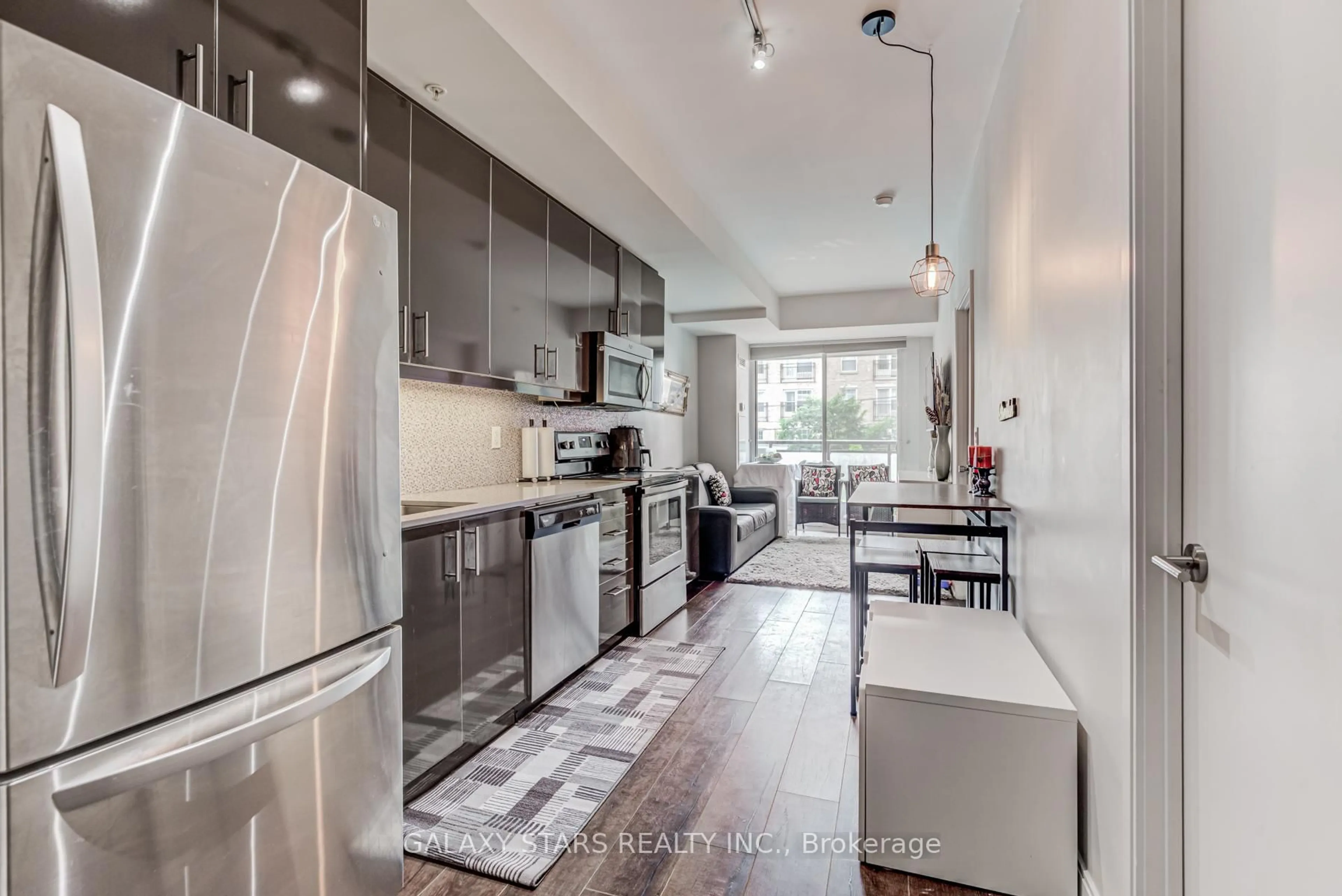 Open concept kitchen, ceramic/tile floor for 760 The Queensway #212, Toronto Ontario M8Z 0E1