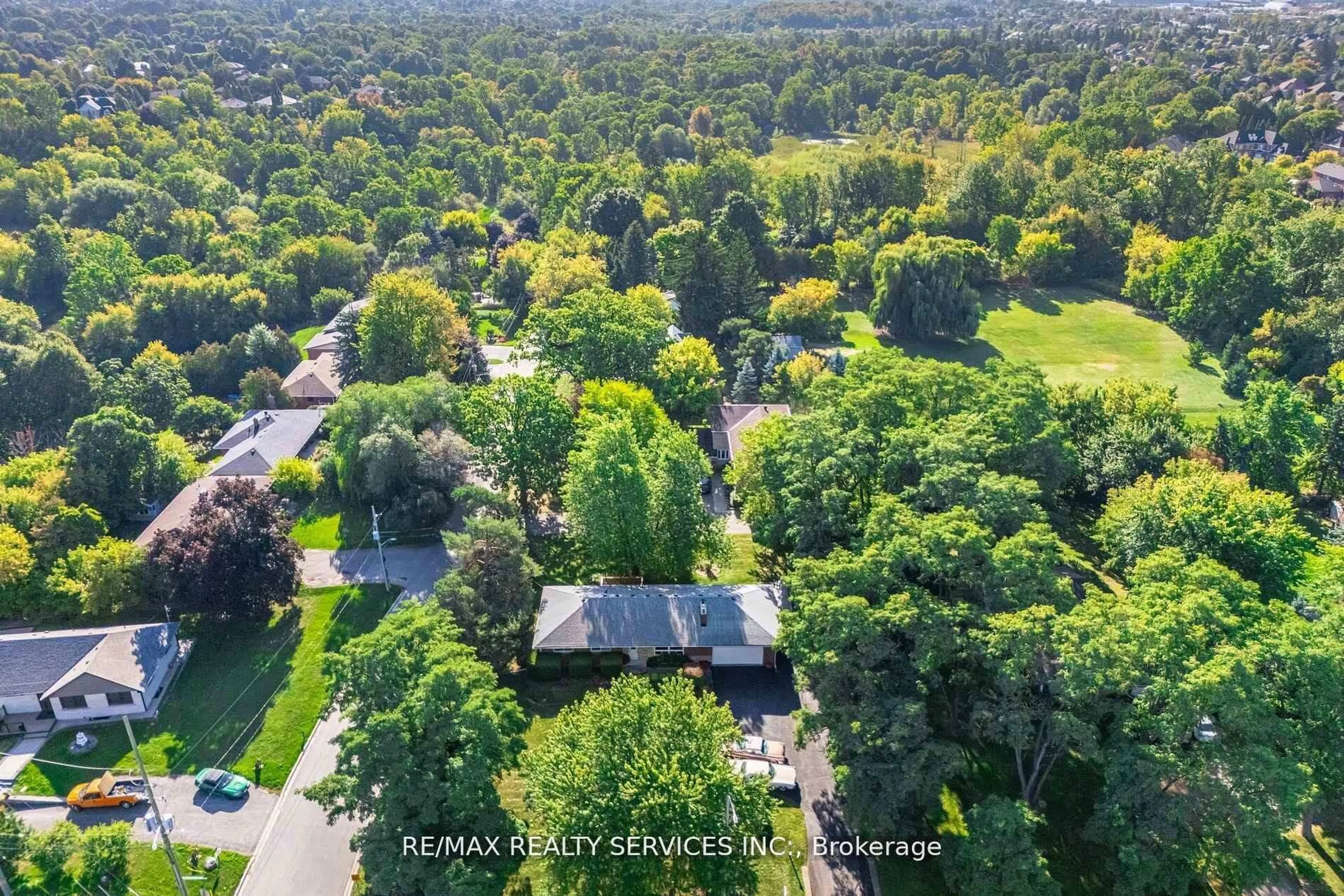 A pic from outside/outdoor area/front of a property/back of a property/a pic from drone, forest/trees view for 3173 Mayfield Rd, Brampton Ontario L6Z 4P9
