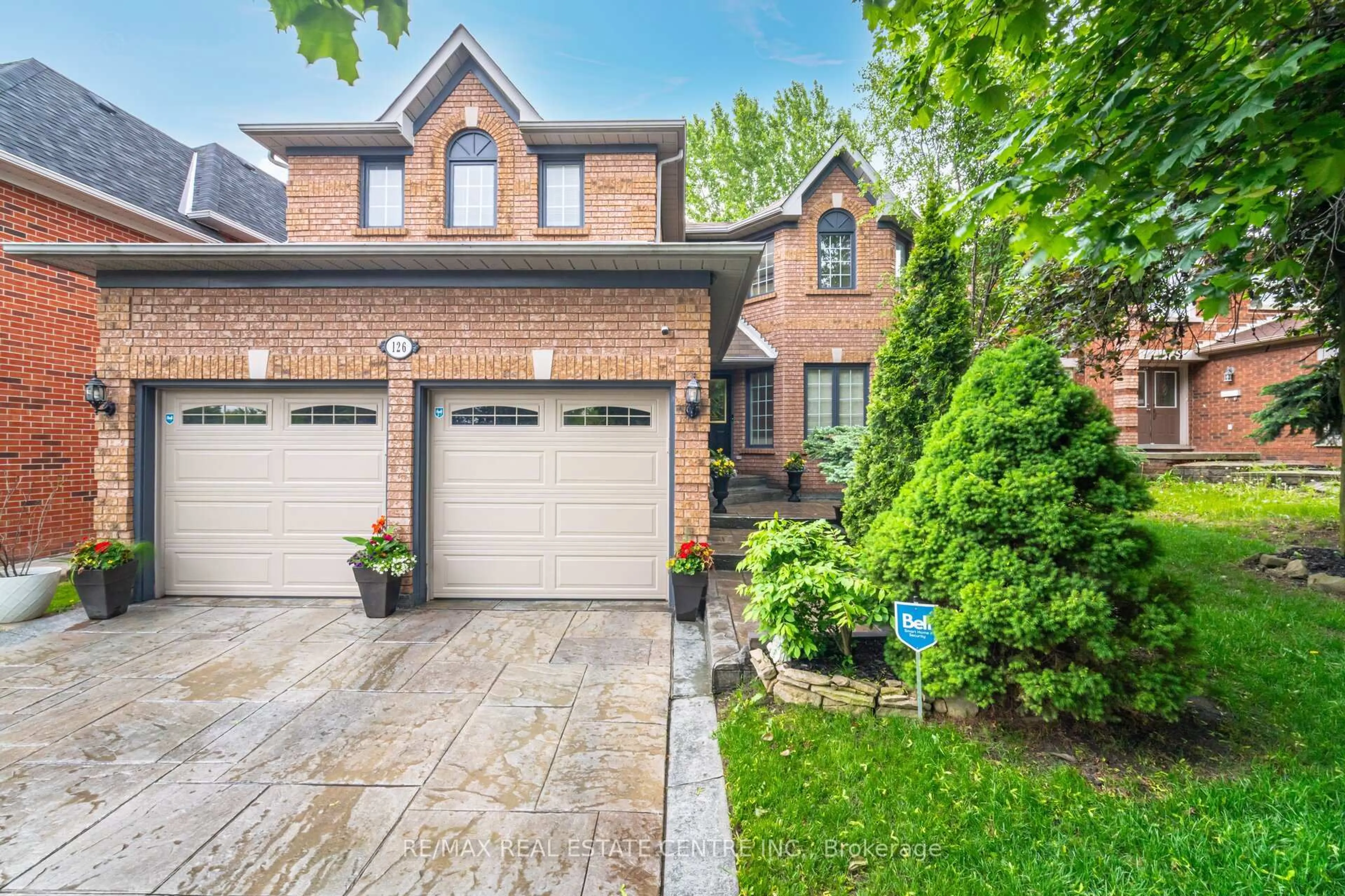 Home with brick exterior material, street for 126 Eagleridge Dr, Brampton Ontario L6R 1E3