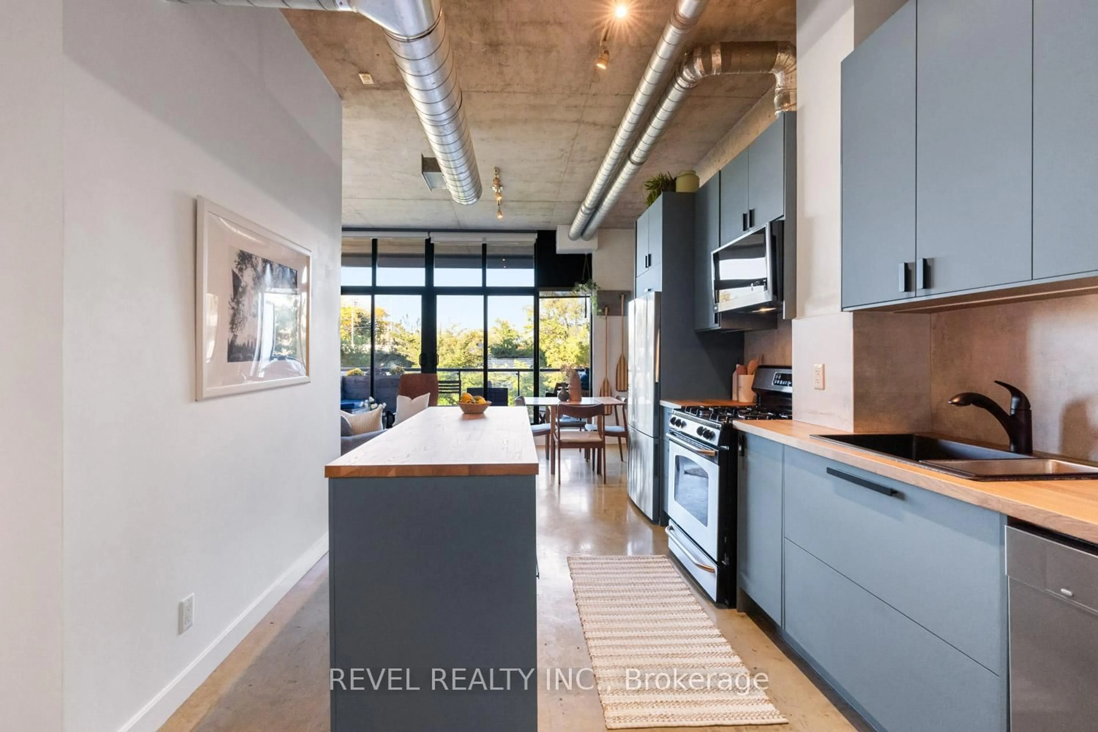 Open concept kitchen, unknown for 369 Sorauren Ave #204, Toronto Ontario M6R 3C2