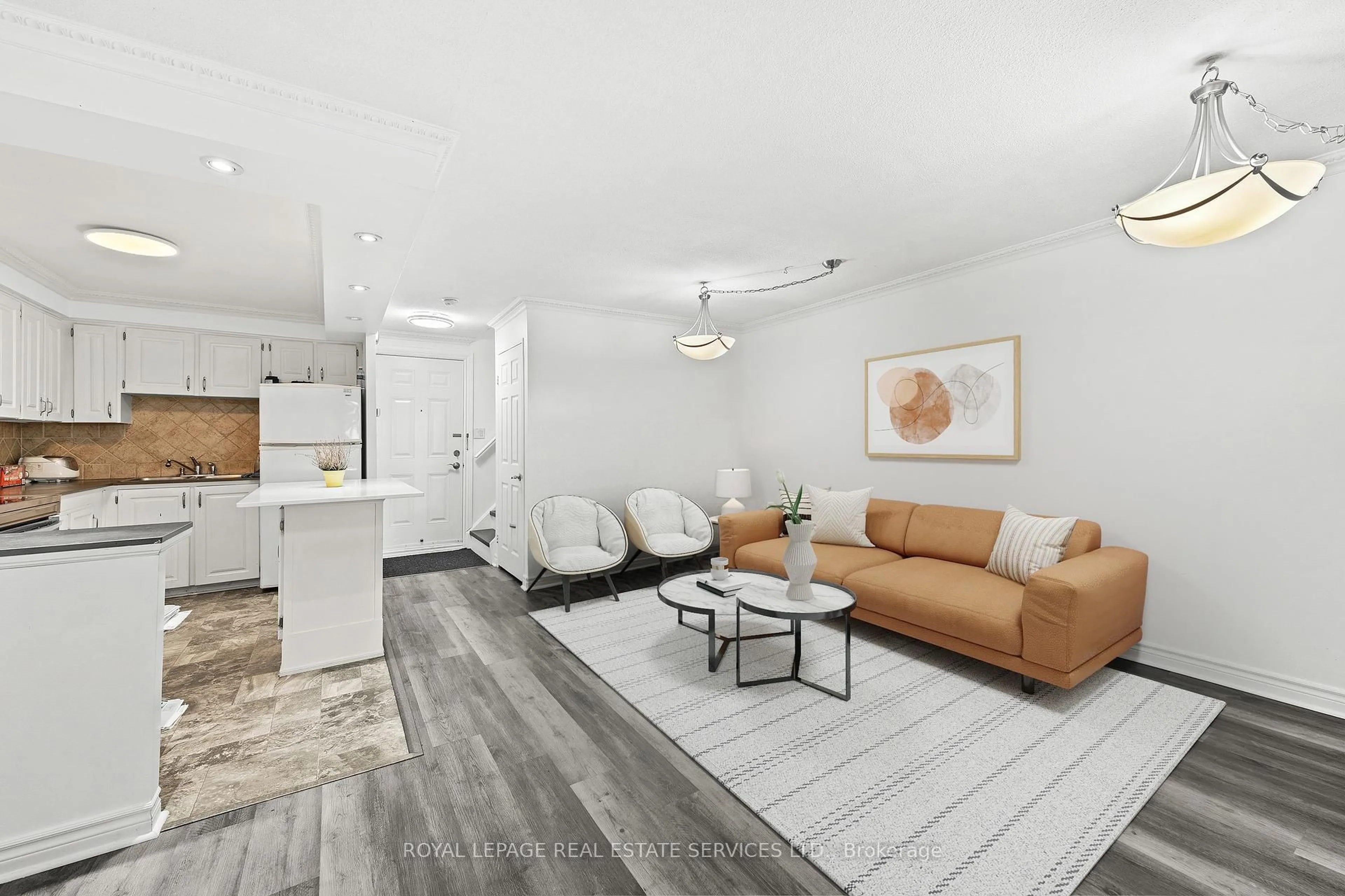 Living room with furniture, unknown for 3040 Constitution Blvd #103, Mississauga Ontario L4Y 3X7