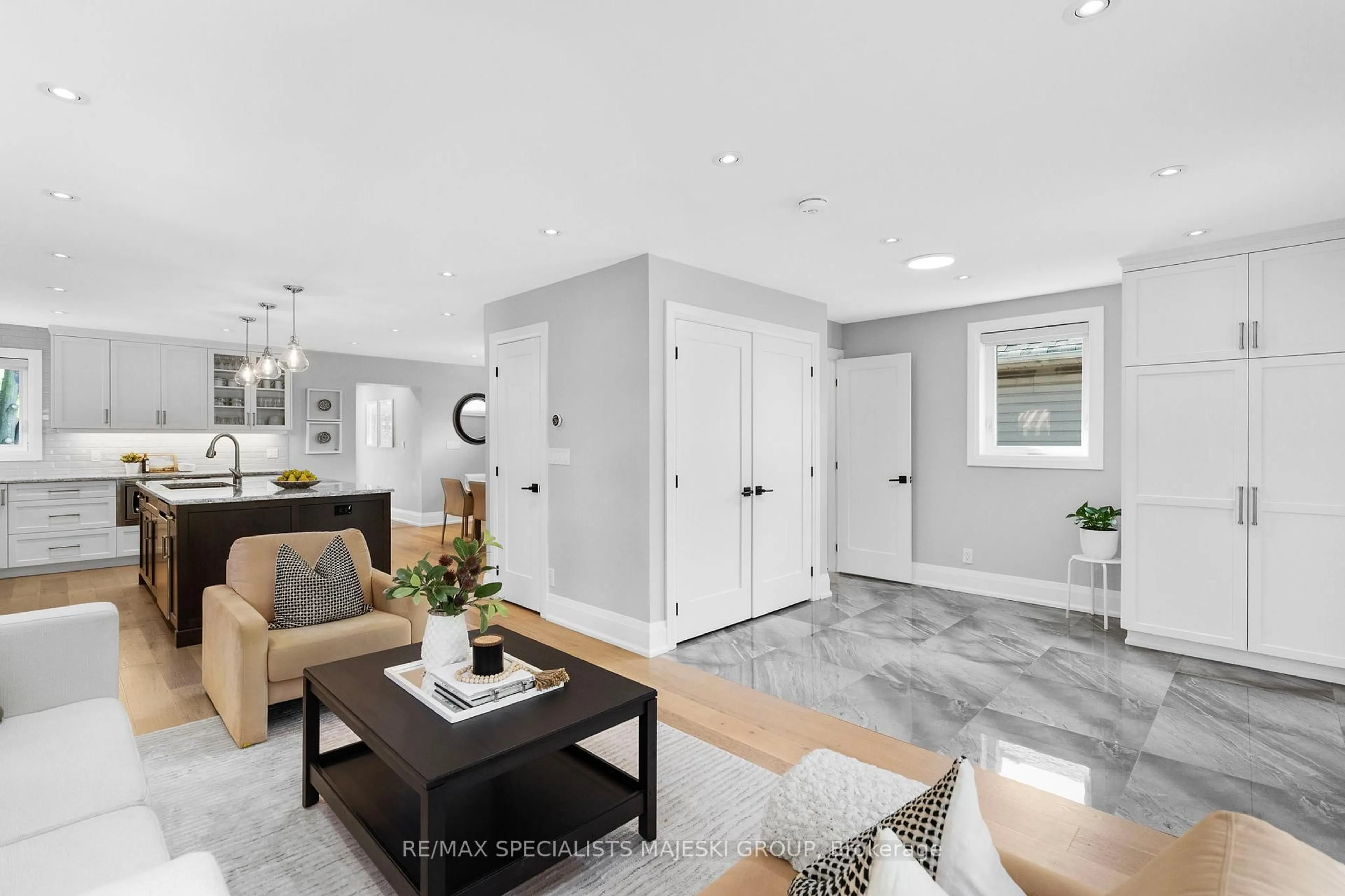 Living room with furniture, ceramic/tile floor for 21 Heman St, Toronto Ontario M8V 1X4
