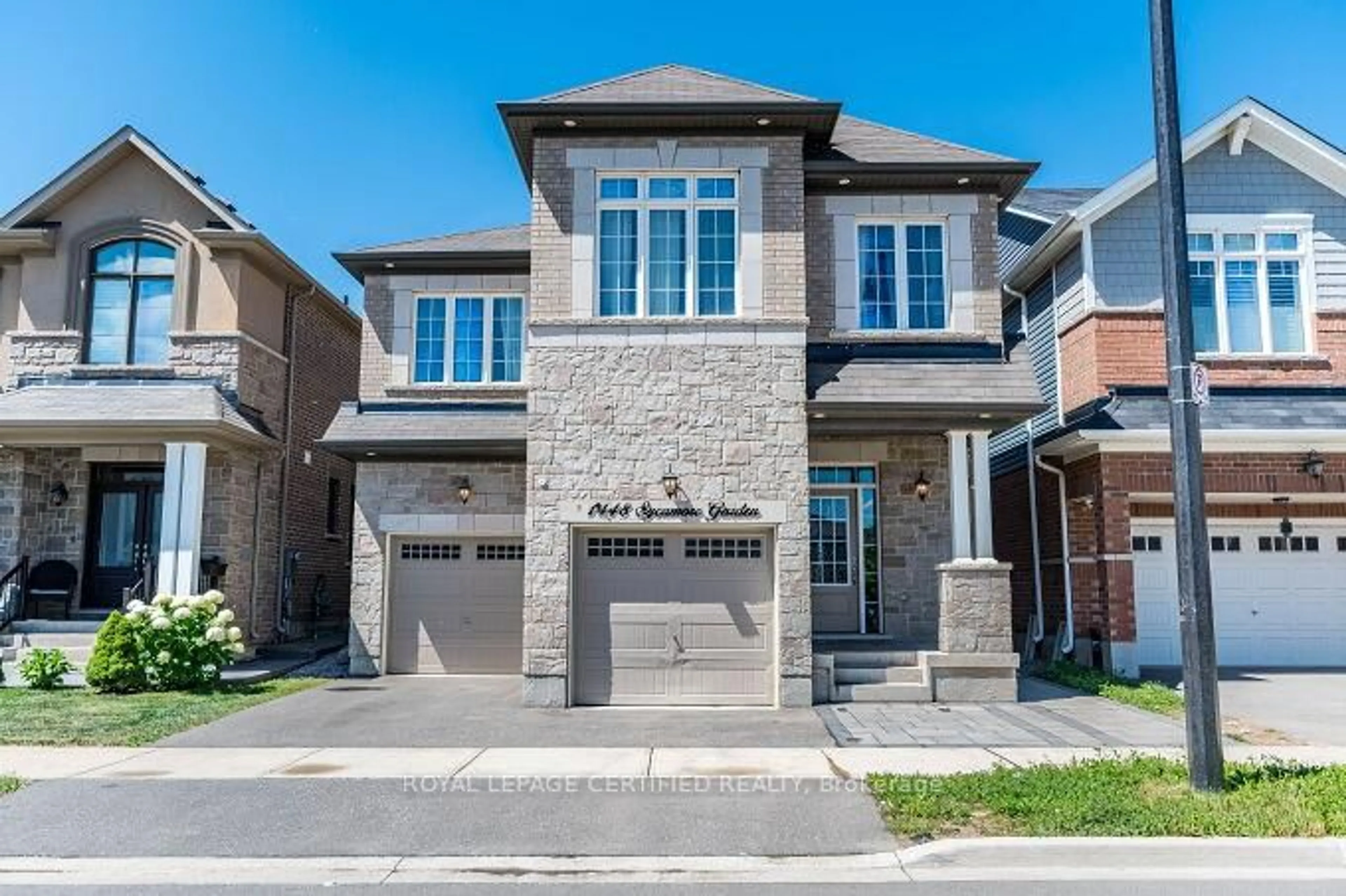 Home with brick exterior material, street for 1448 Sycamore Garden, Milton Ontario L9E 1P7