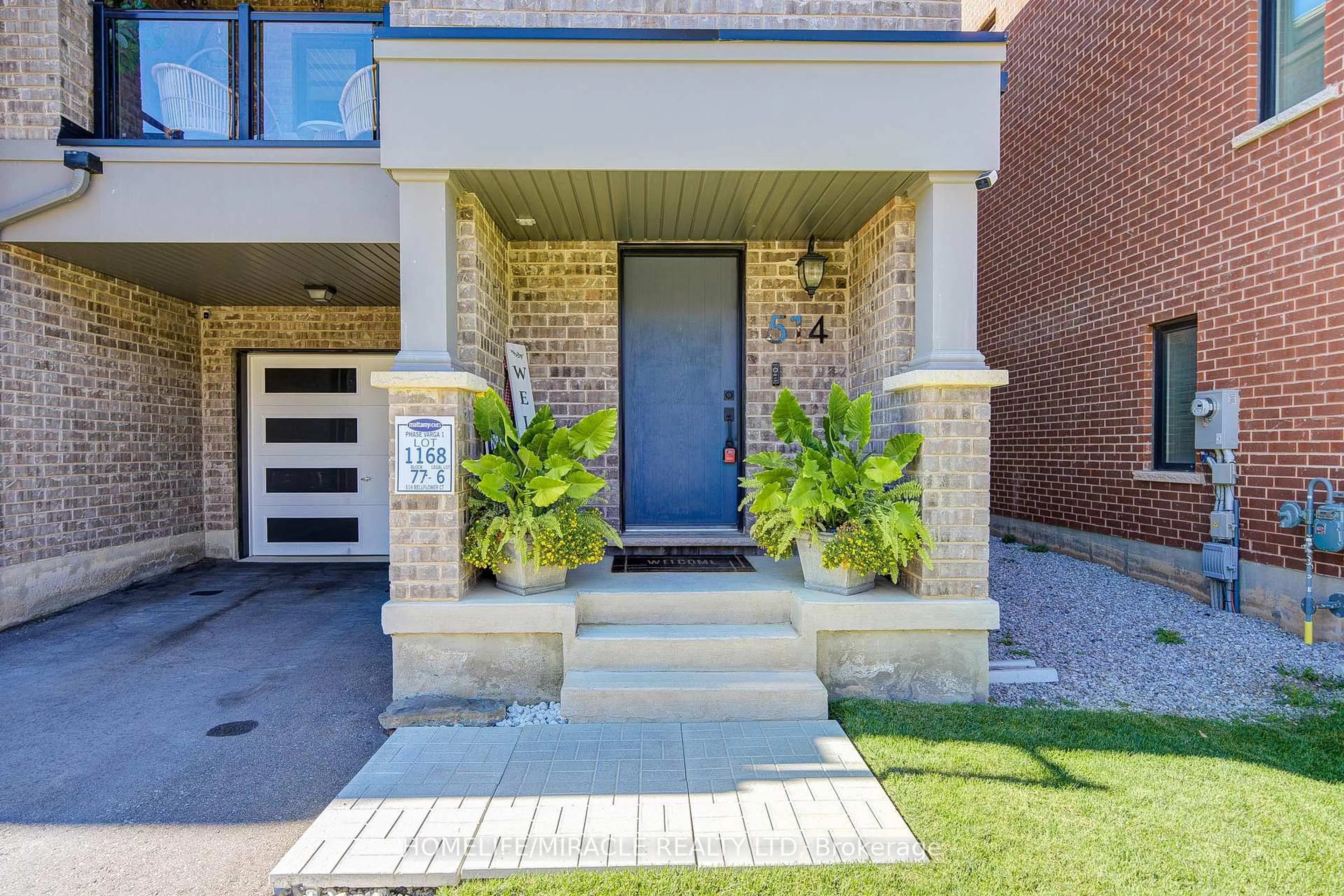 Home with brick exterior material, street for 514 Bellflower Crt, Milton Ontario L9E 1W4