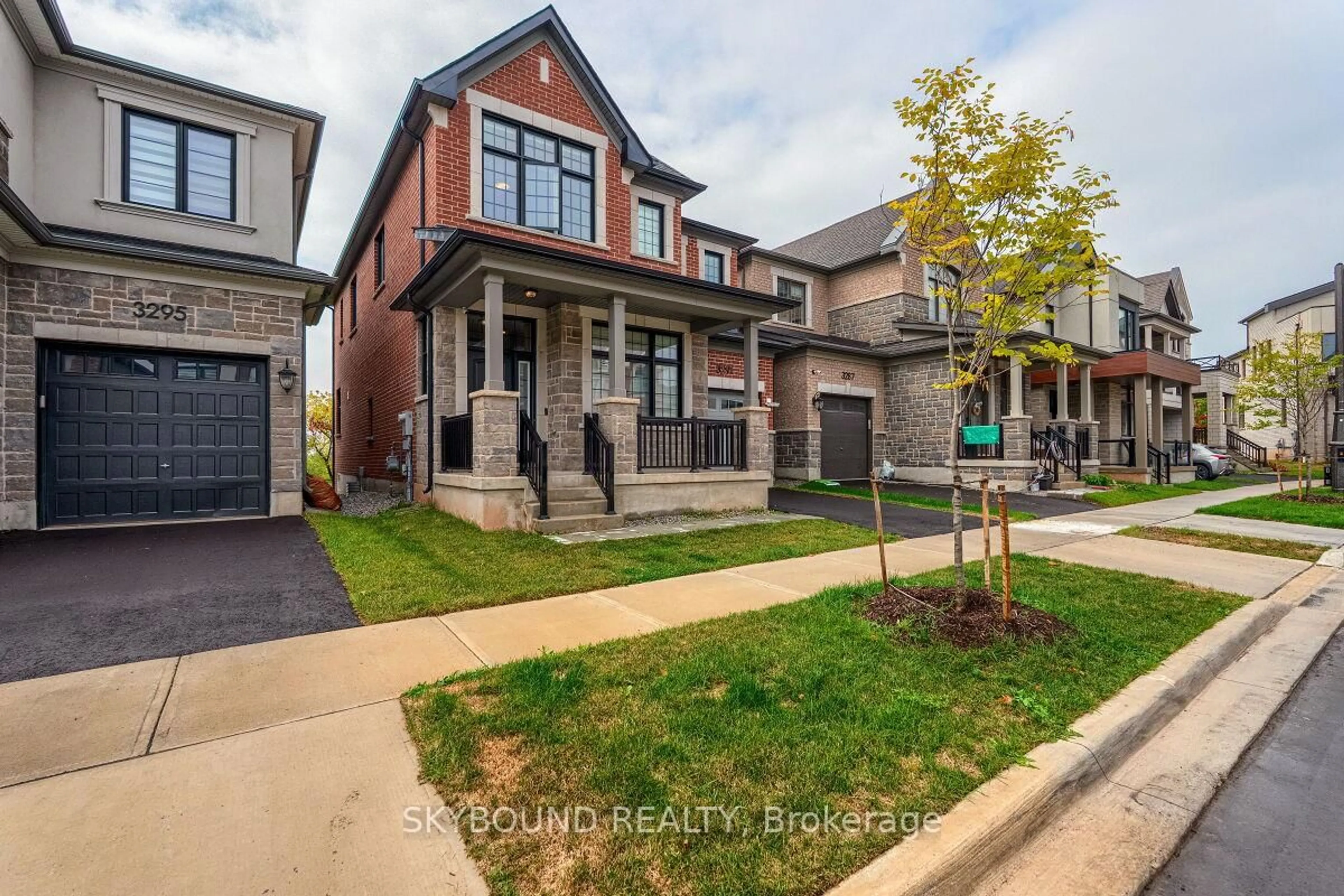 Home with brick exterior material, street for 3291 Harasym Tr, Oakville Ontario L6M 5N6