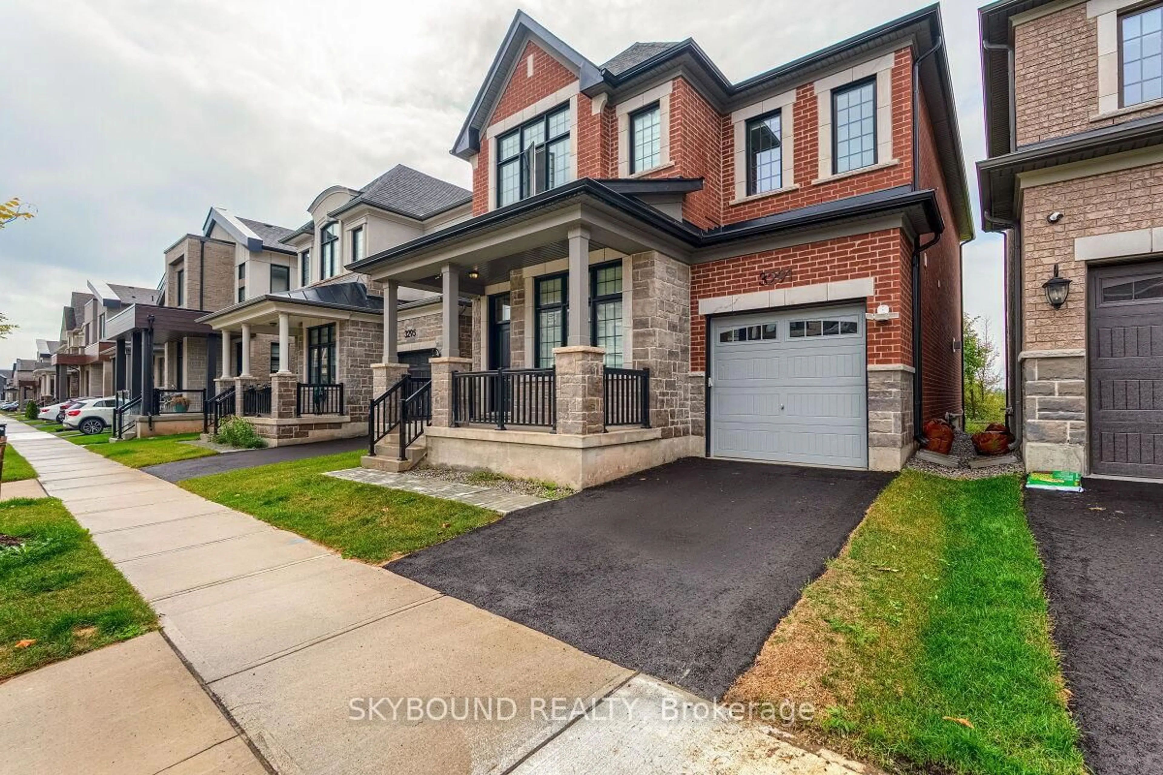 Home with brick exterior material, street for 3291 Harasym Tr, Oakville Ontario L6M 5N6