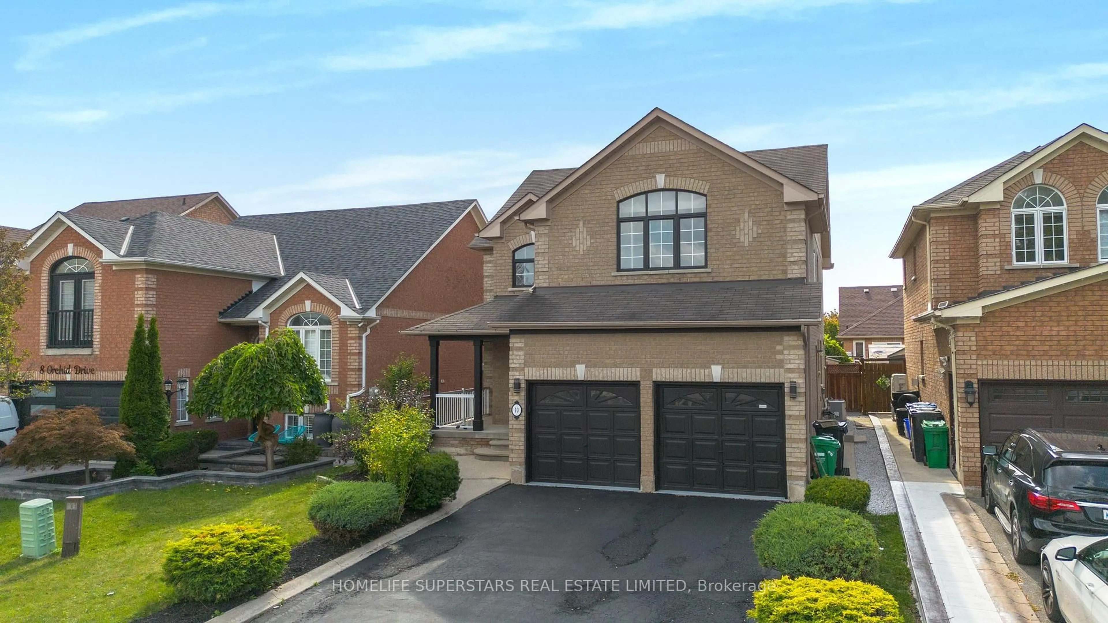 Home with brick exterior material, street for 10 Orchid Dr, Brampton Ontario L7A 1M4