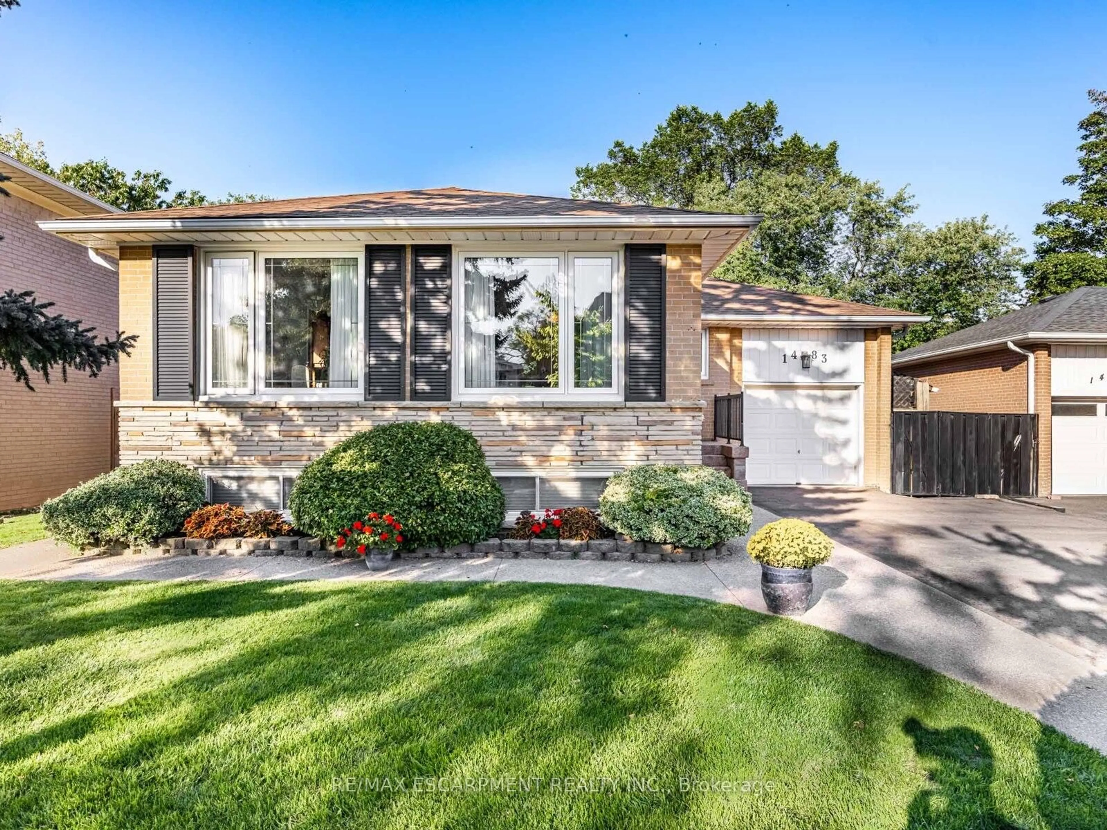 Home with brick exterior material, street for 1483 Karenza Rd, Mississauga Ontario L5J 3W3