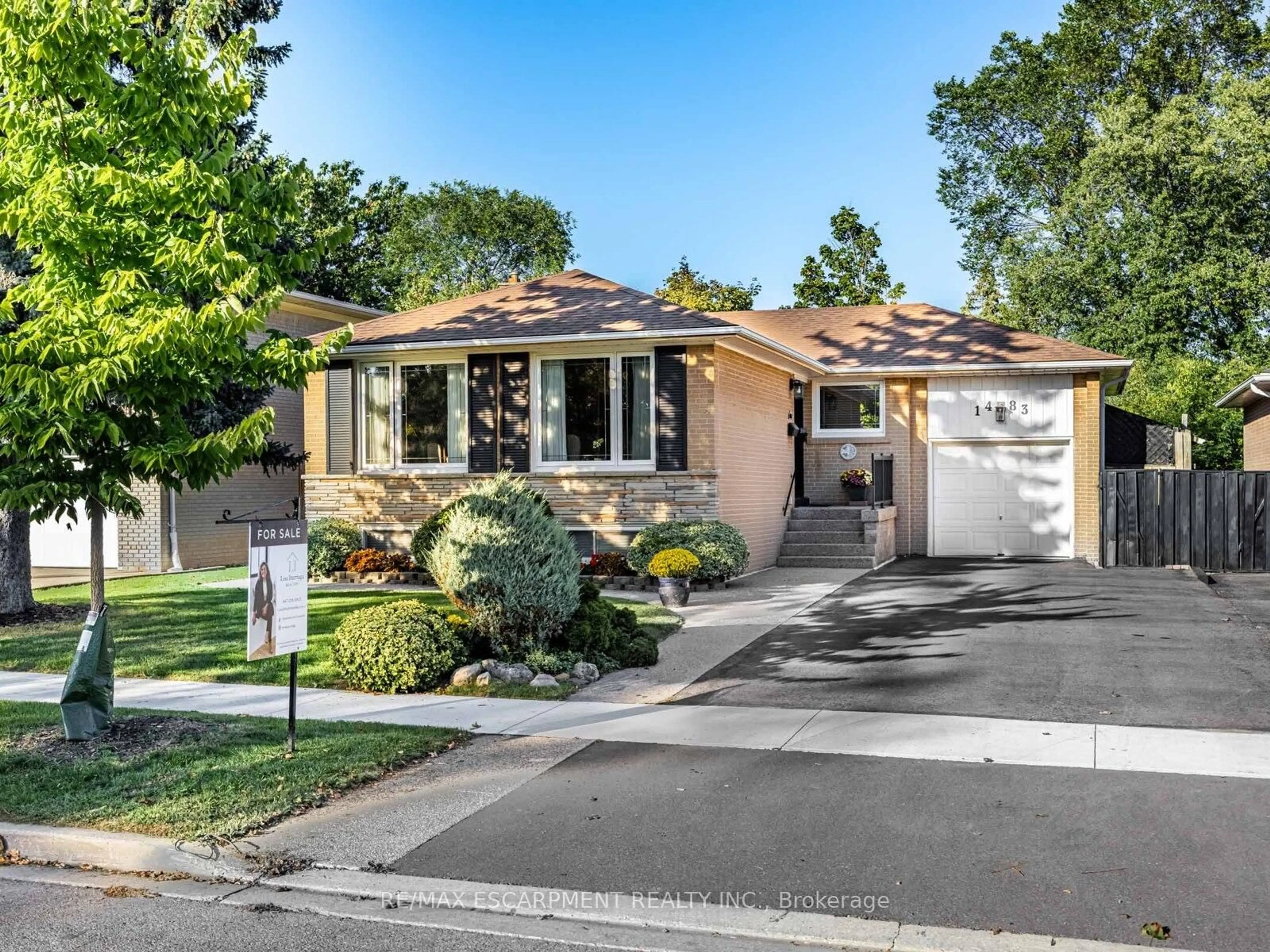 Home with vinyl exterior material, street for 1483 Karenza Rd, Mississauga Ontario L5J 3W3
