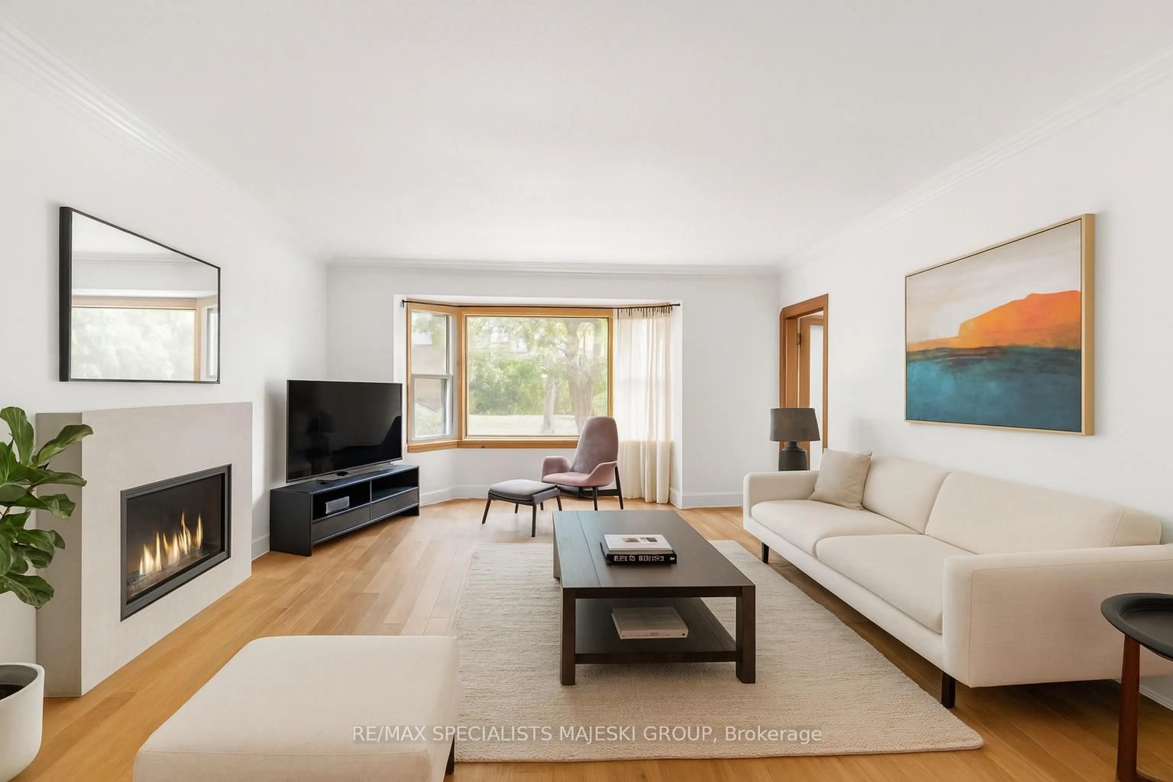 Living room with furniture, wood/laminate floor for 50 Twenty Third St, Toronto Ontario M8V 3M6