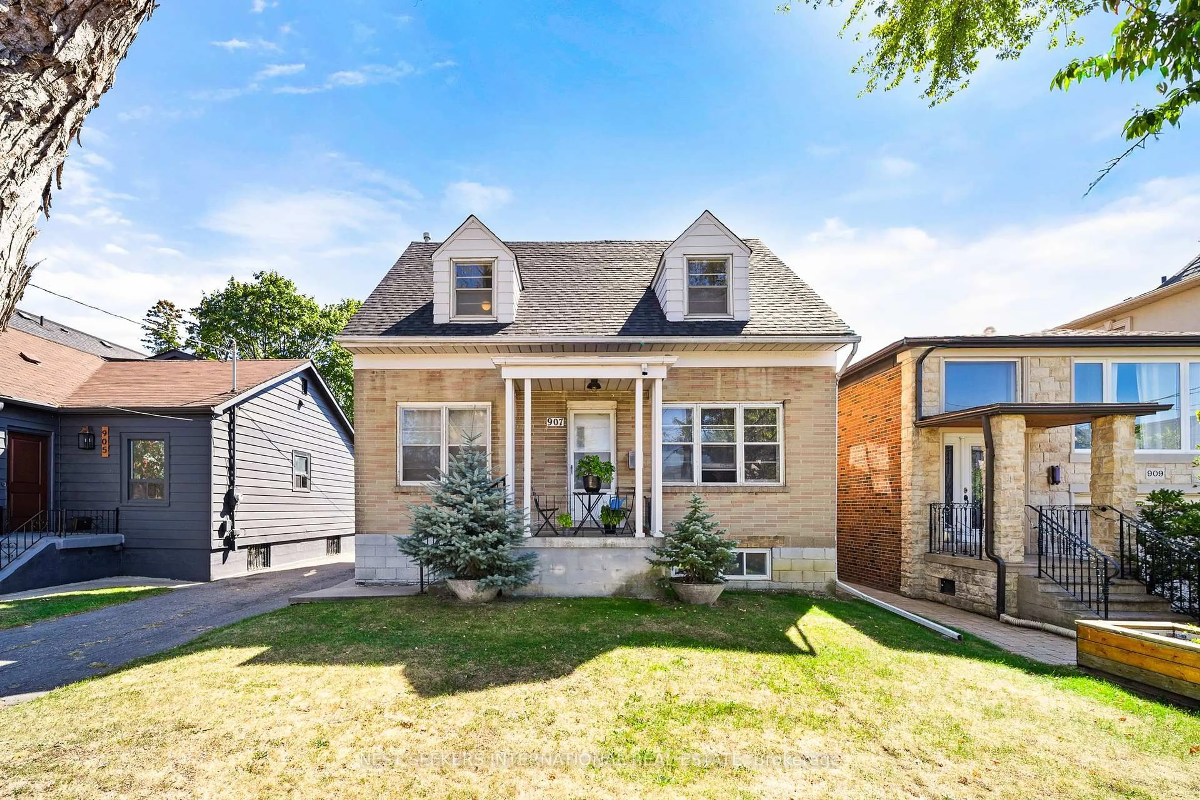 Home with brick exterior material, street for 907 Glencairn Ave, Toronto Ontario M6B 2A6