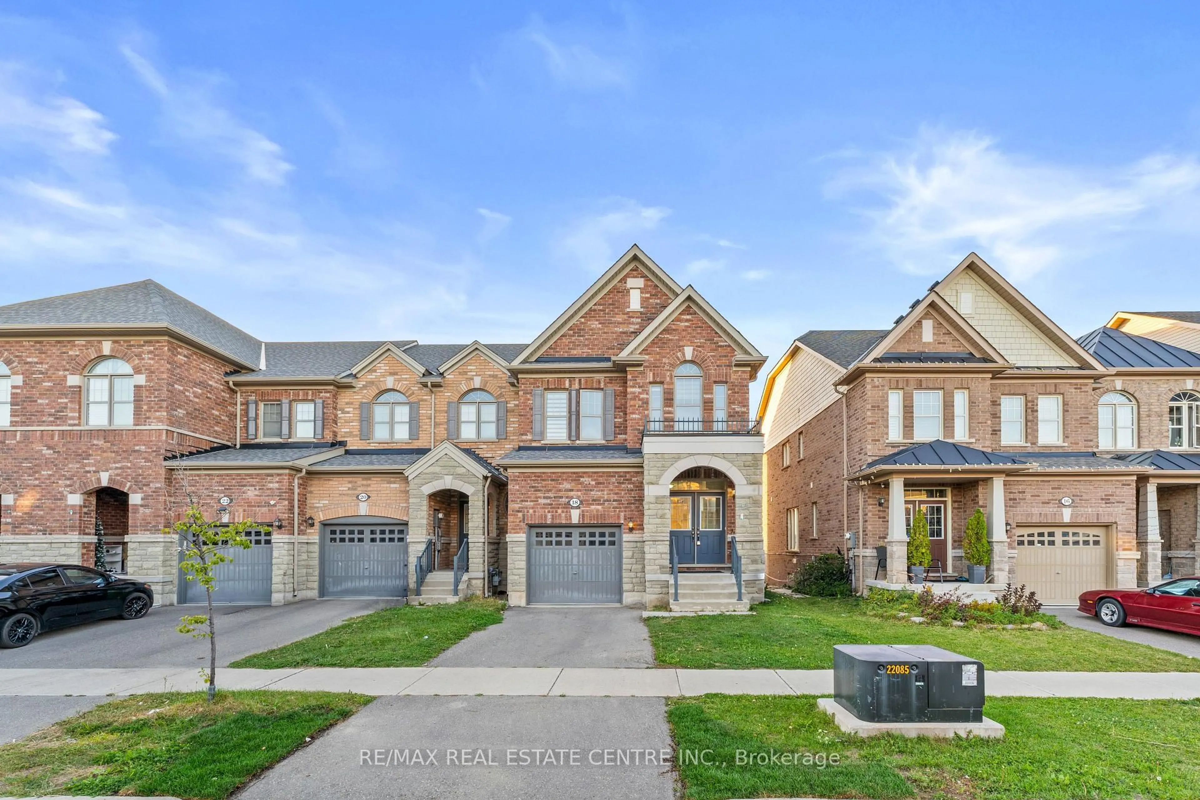Home with brick exterior material, street for 18 Hogan Manor Dr, Brampton Ontario L7A 4V4