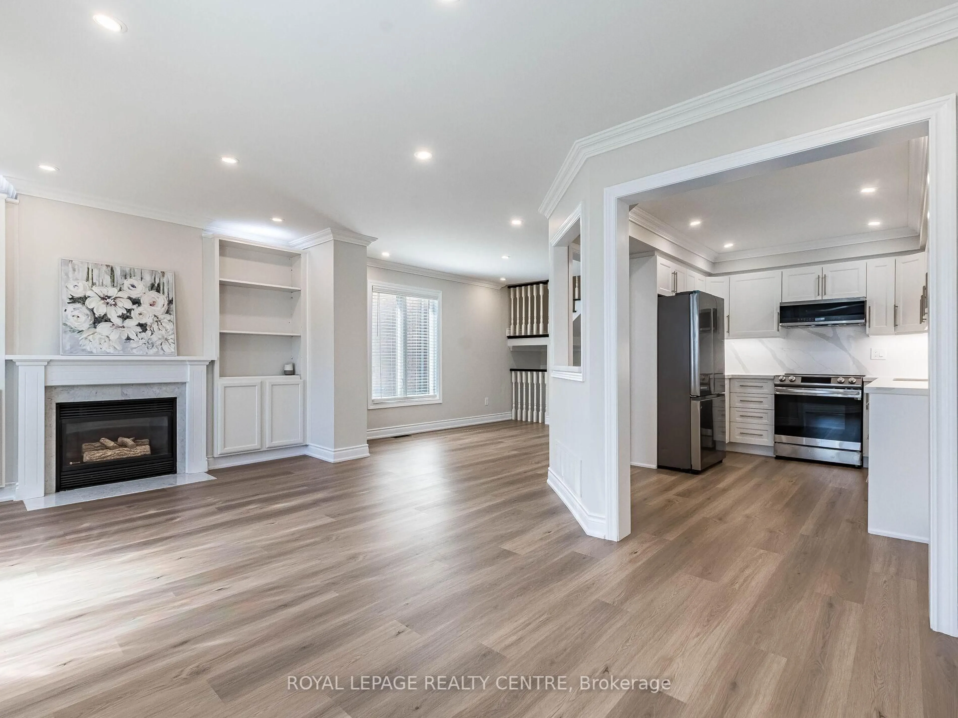 Open concept kitchen, wood/laminate floor for 455 Apache Crt #62, Mississauga Ontario L4Z 3W8