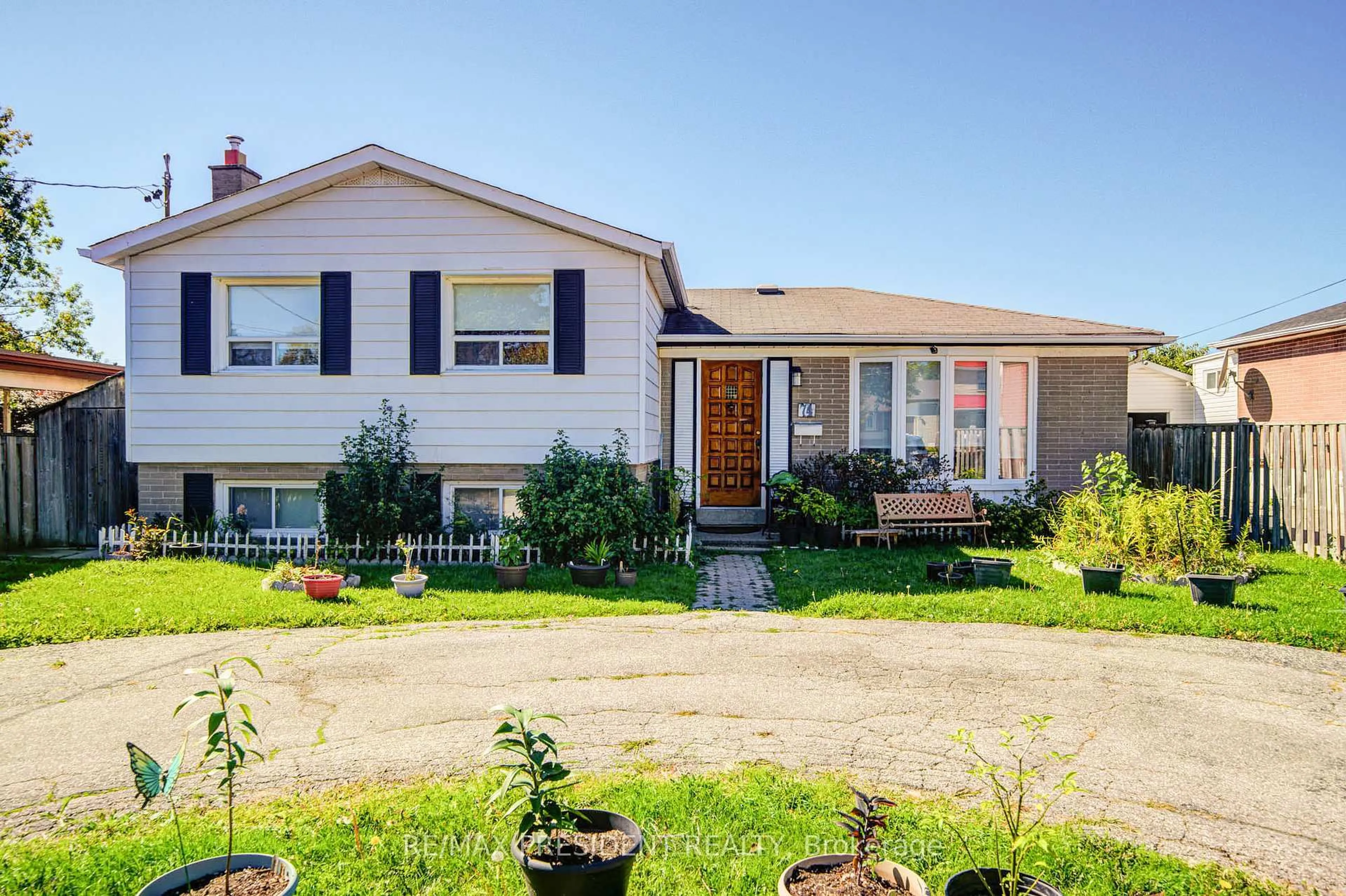 Home with vinyl exterior material, street for 74 Bloomington Cres, Toronto Ontario M3N 1R1