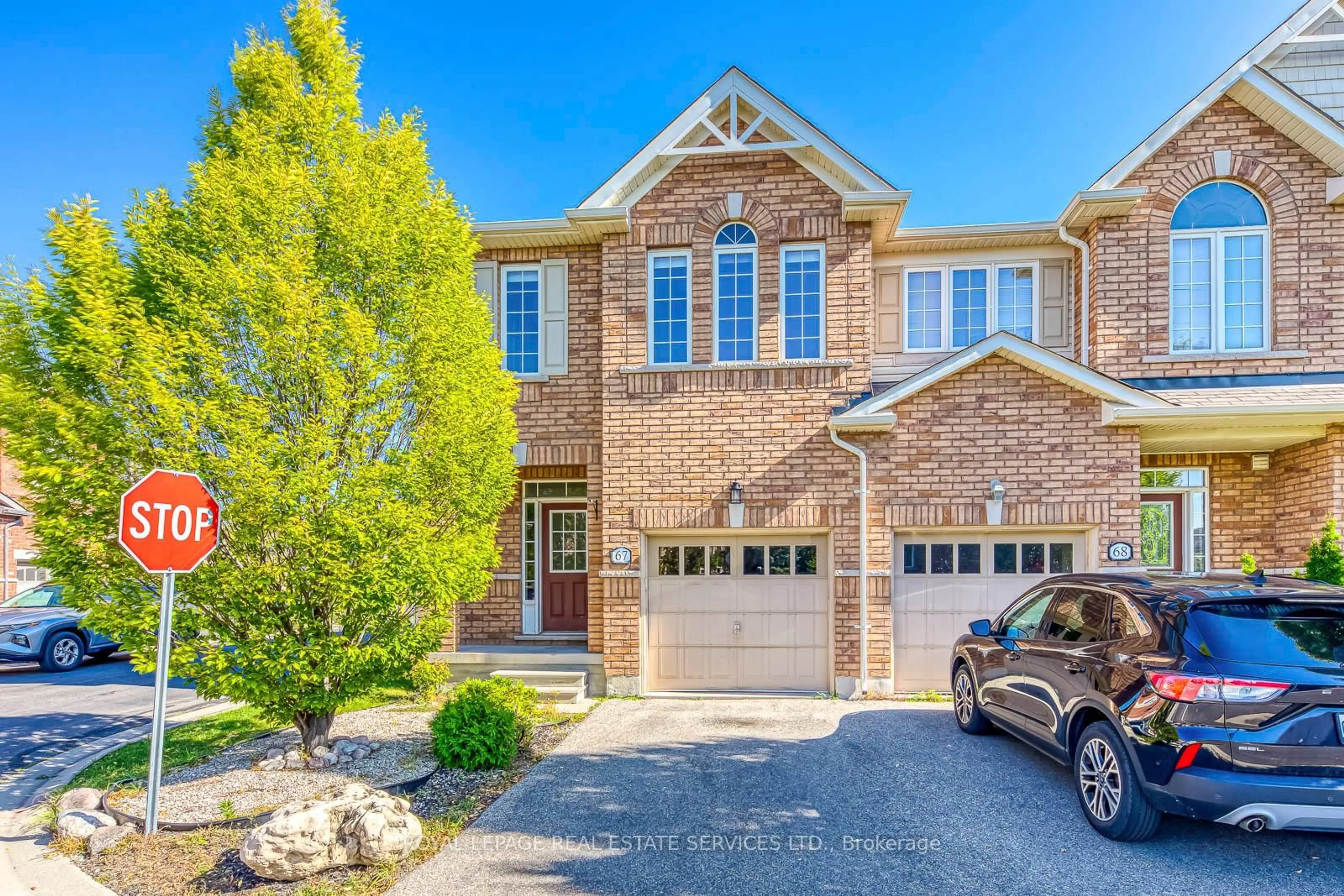 Home with brick exterior material, street for 651 Farmstead Dr #67, Milton Ontario L9T 7W2
