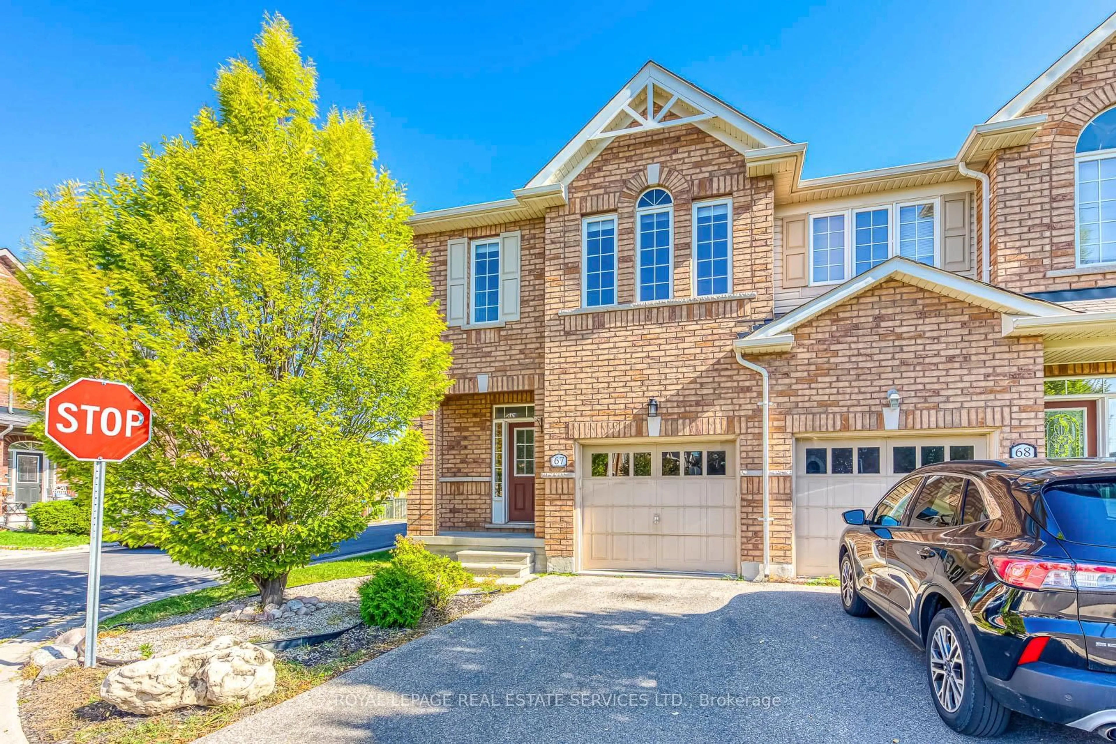 Home with brick exterior material, street for 651 Farmstead Dr #67, Milton Ontario L9T 7W2