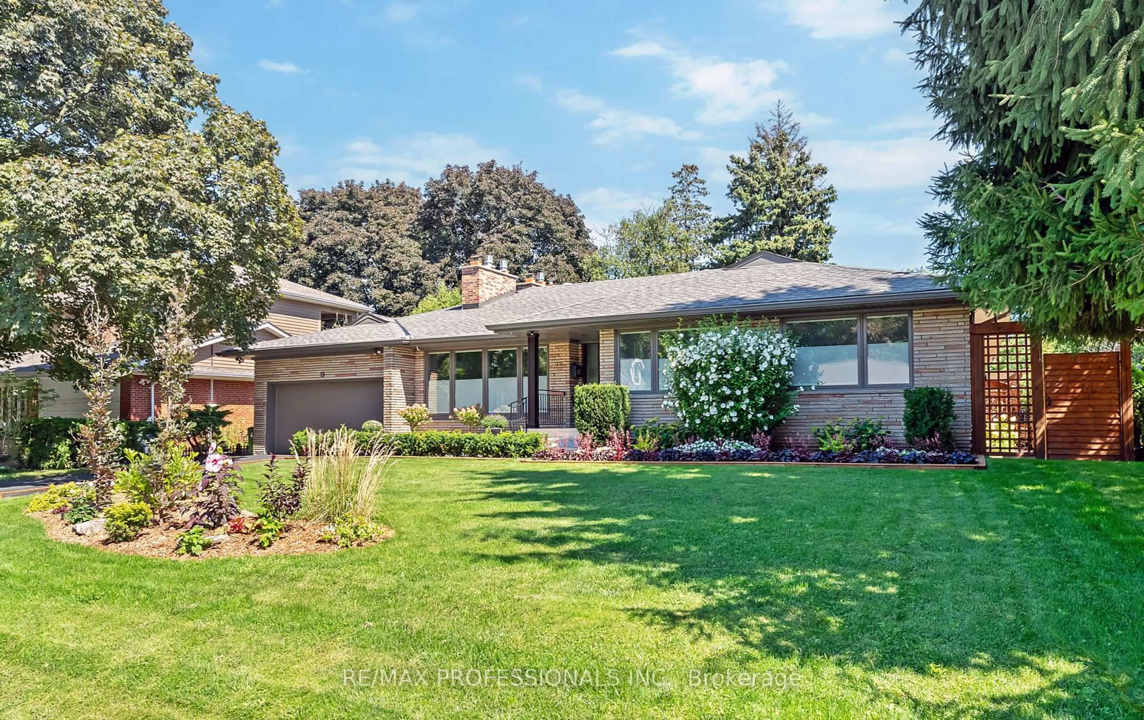 Home with brick exterior material, street for 19 Palace Arch Dr, Toronto Ontario M9A 2R9
