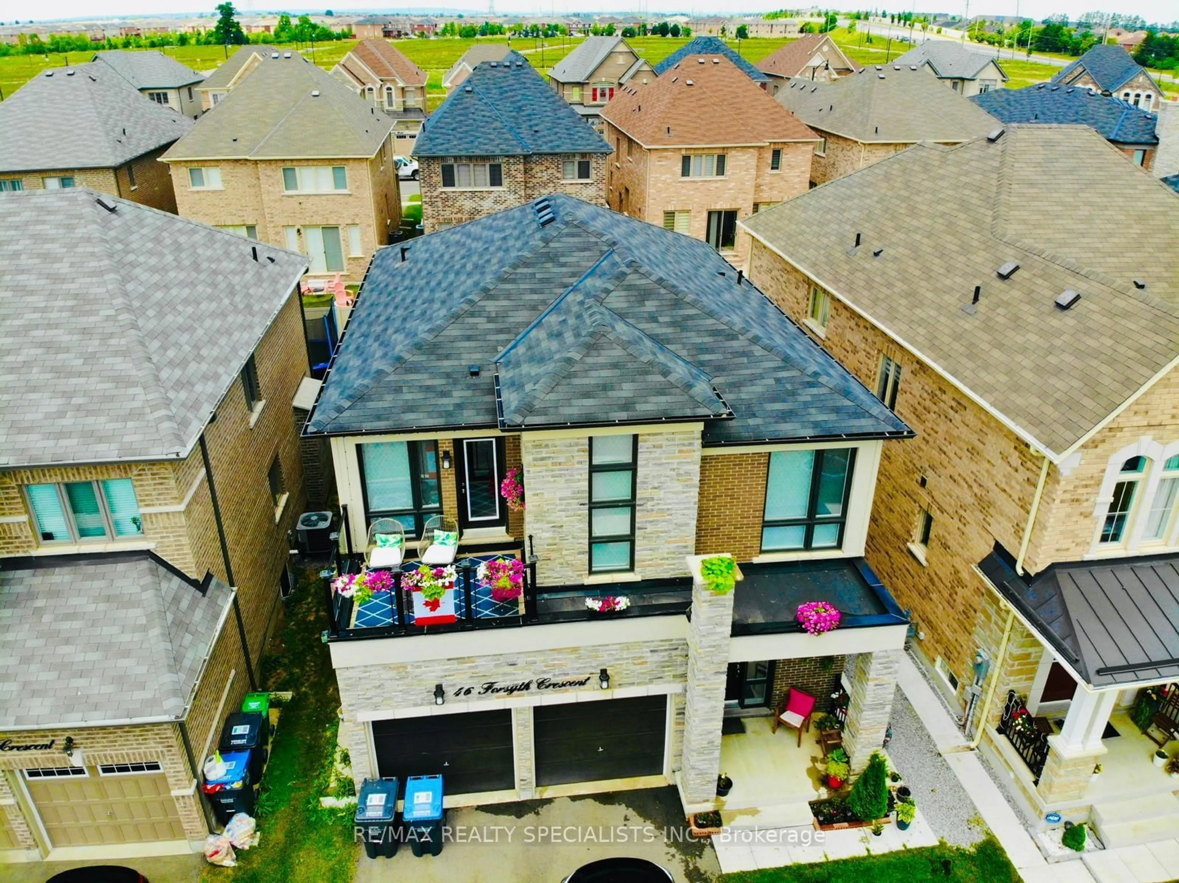 A pic from outside/outdoor area/front of a property/back of a property/a pic from drone, street for 46 Forsyth Cres, Brampton Ontario L6X 5N3