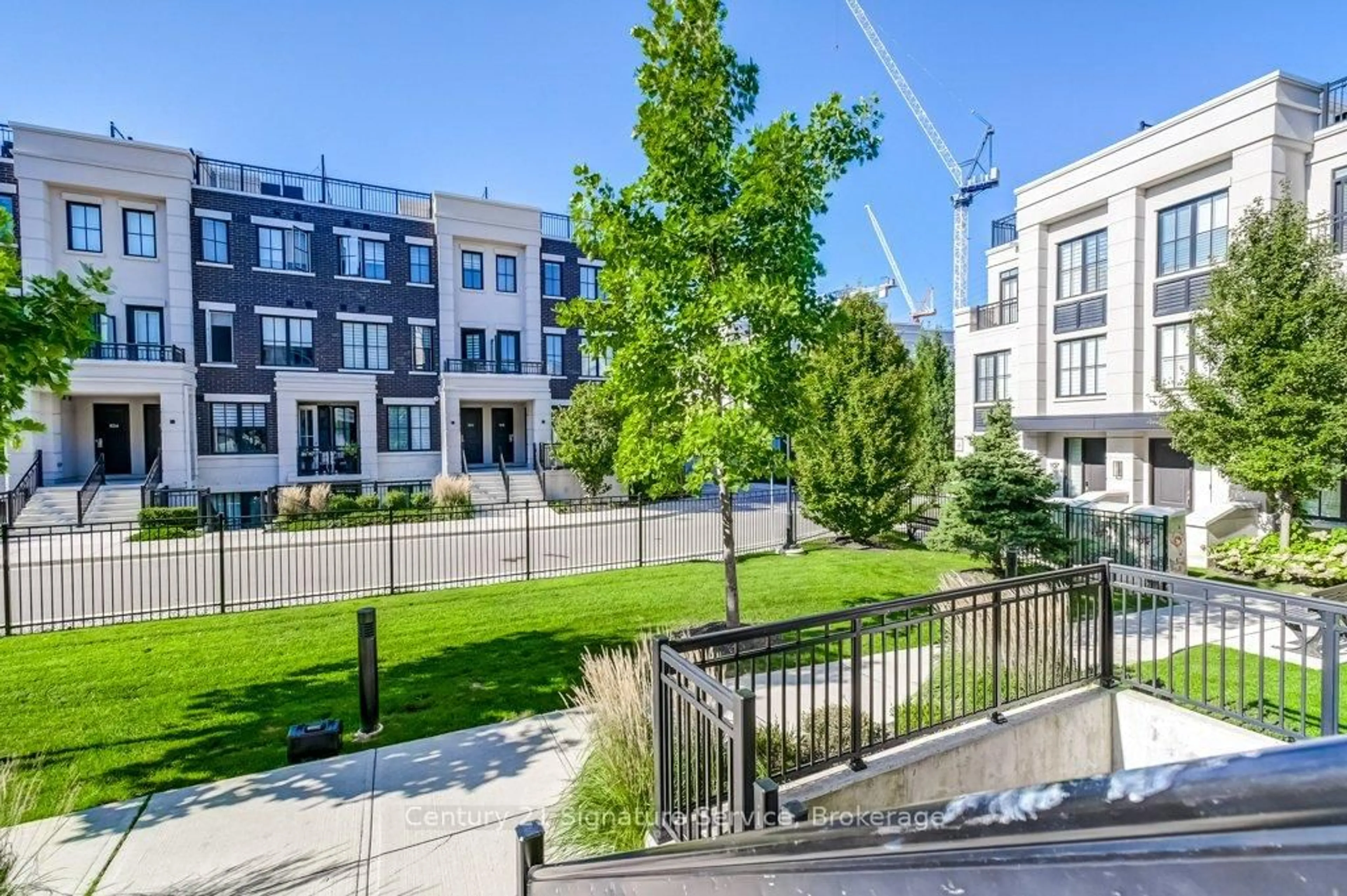 A pic from outside/outdoor area/front of a property/back of a property/a pic from drone, street for 652 Cricklewood Dr #202, Mississauga Ontario L5G 0A5