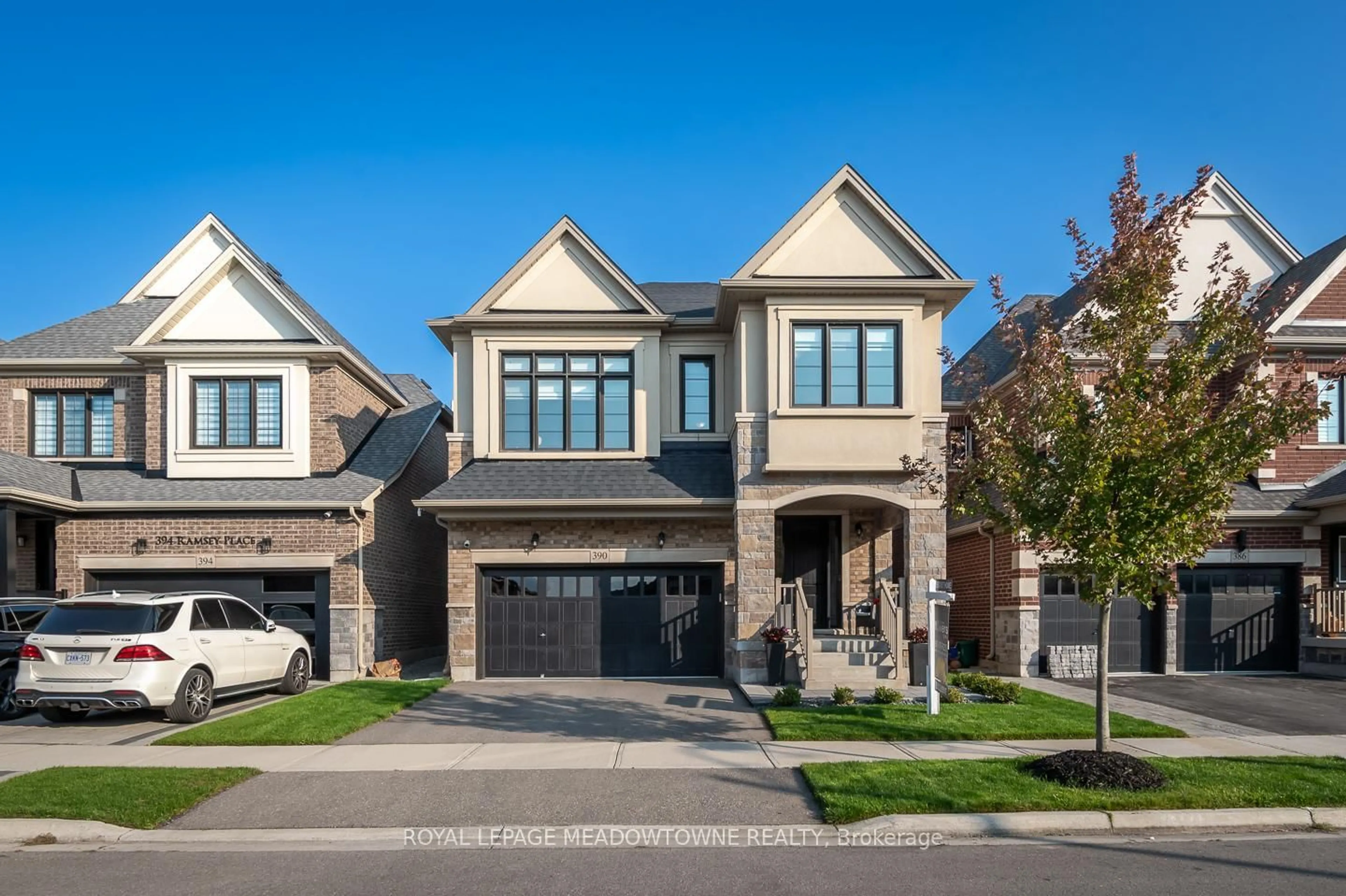 Home with brick exterior material, street for 390 Ramsey Pl, Milton Ontario L9E 1N3