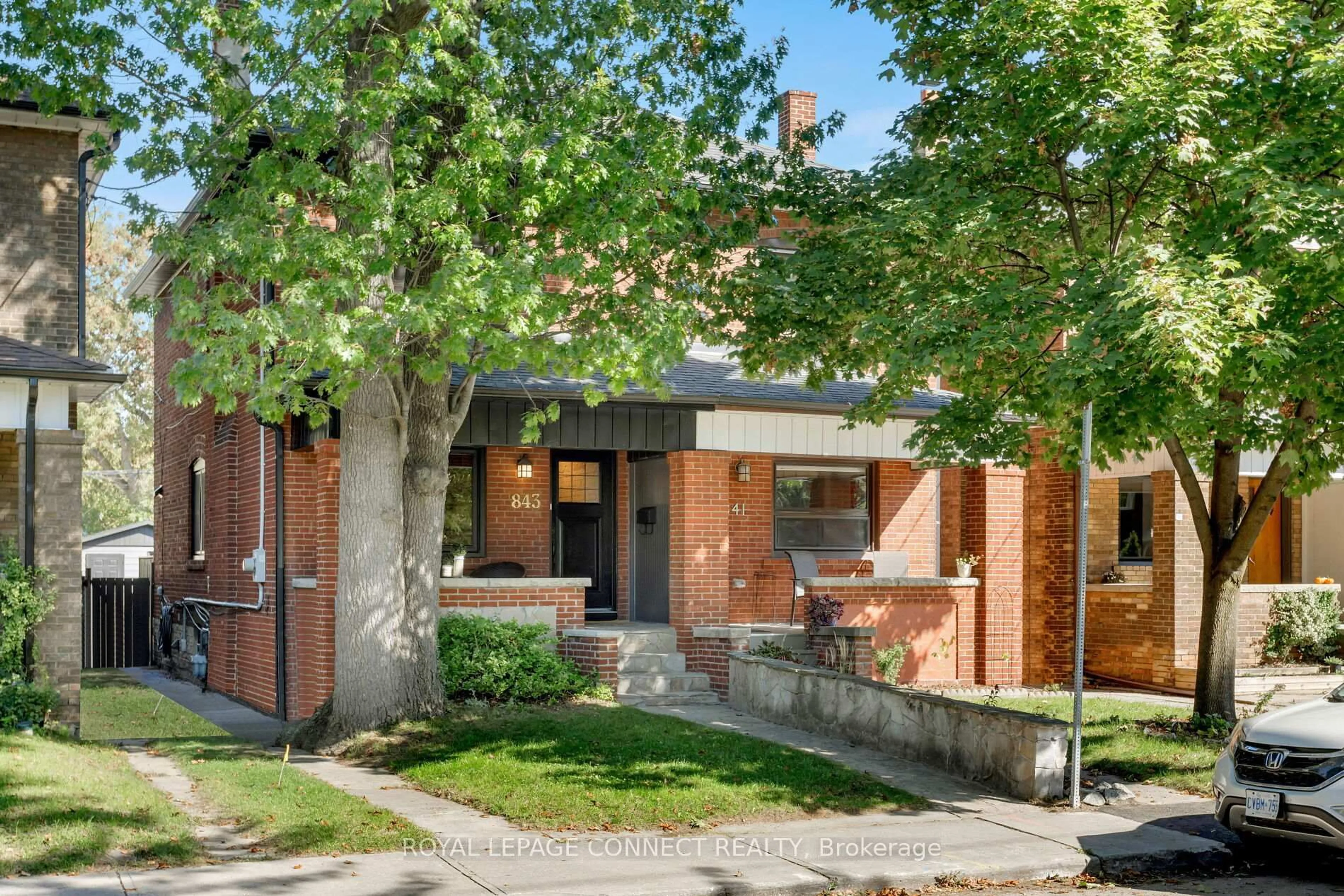Home with brick exterior material, street for 843 Windermere Ave, Toronto Ontario M6S 3M5