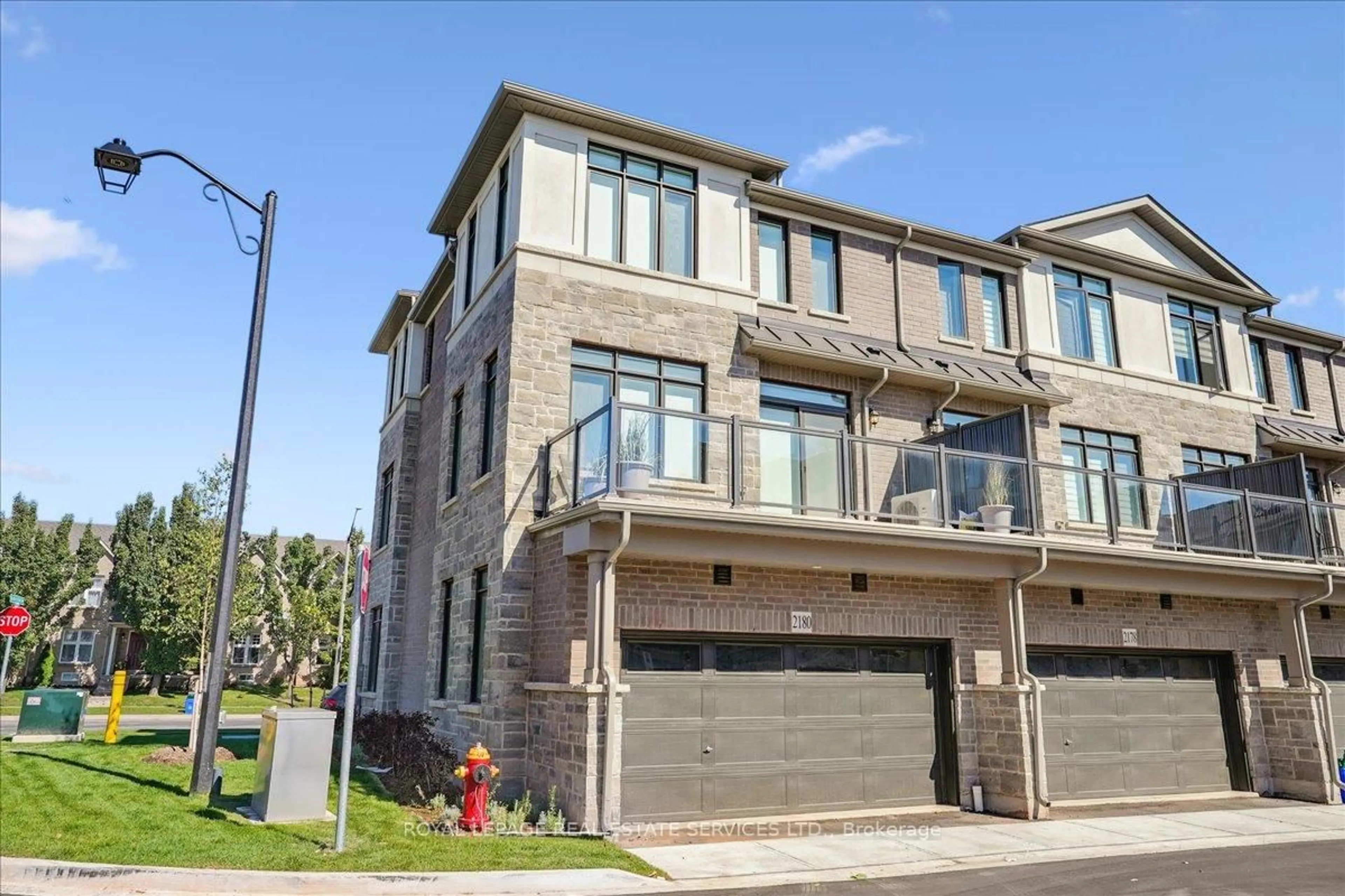 Home with brick exterior material, street for 2180 Postmaster Dr, Oakville Ontario L6M 5T1