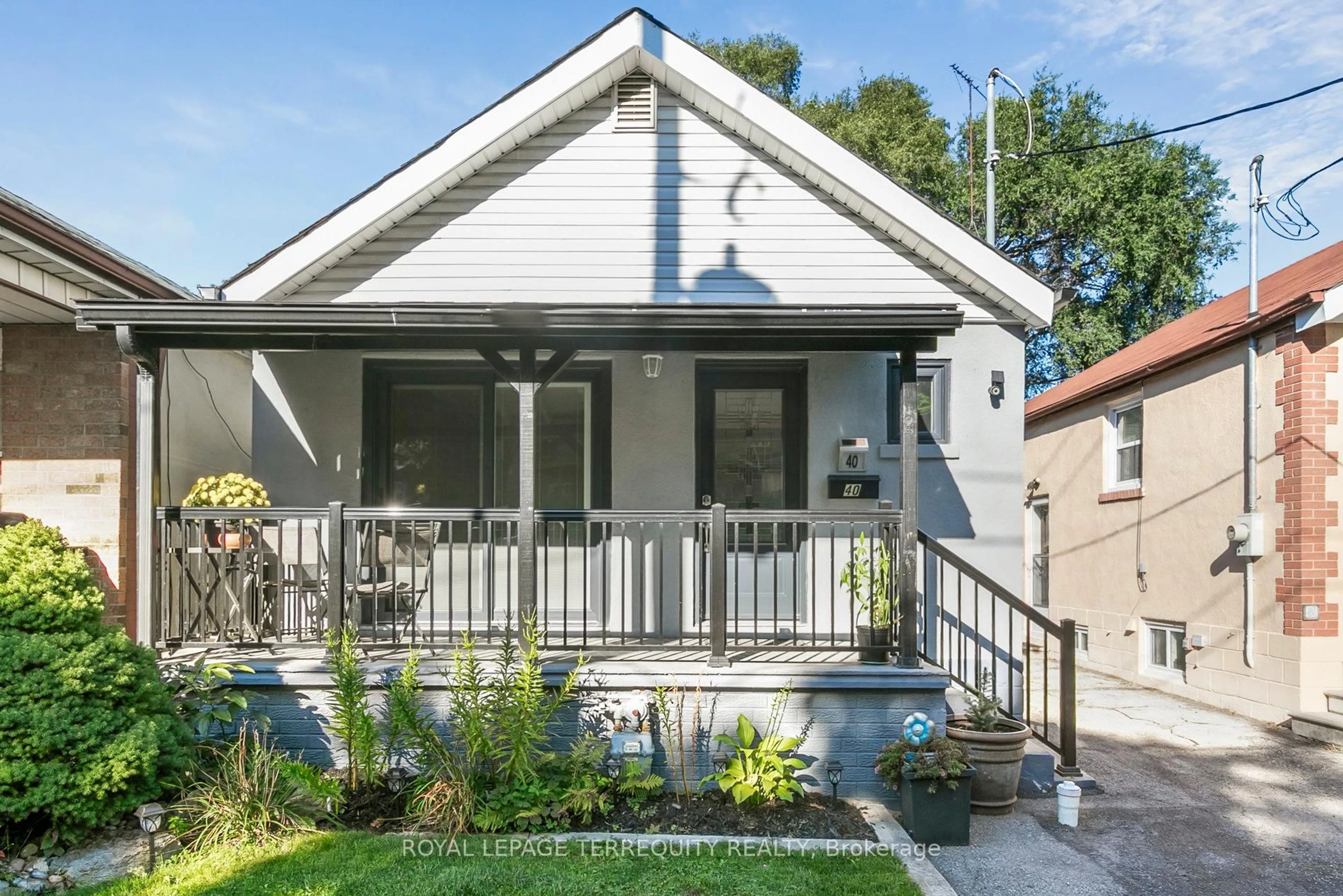 Home with vinyl exterior material, street for 40 Haverson Blvd, Toronto Ontario M6M 3J6