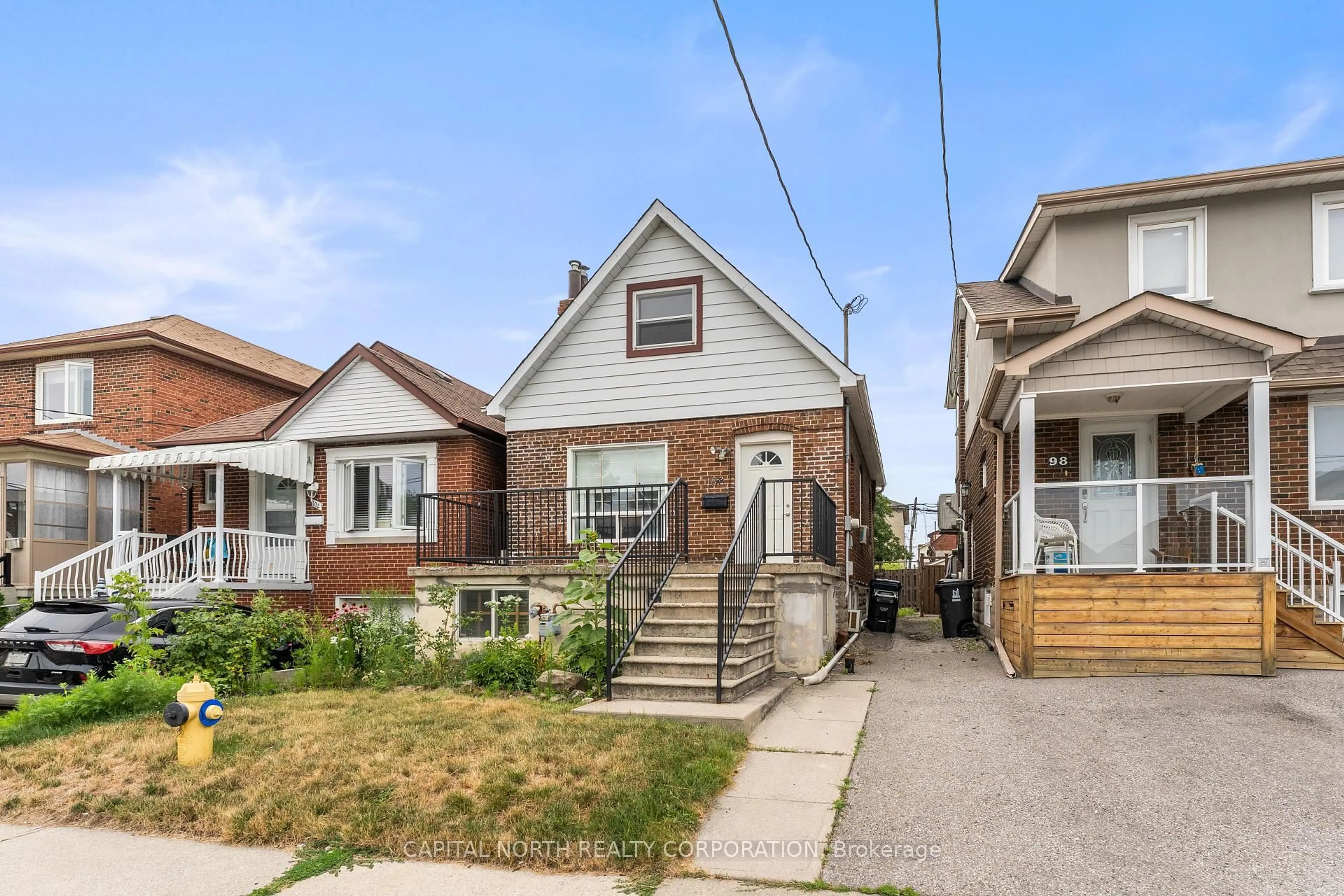Home with brick exterior material, street for 100 Livingstone Ave, Toronto Ontario M6E 2L8