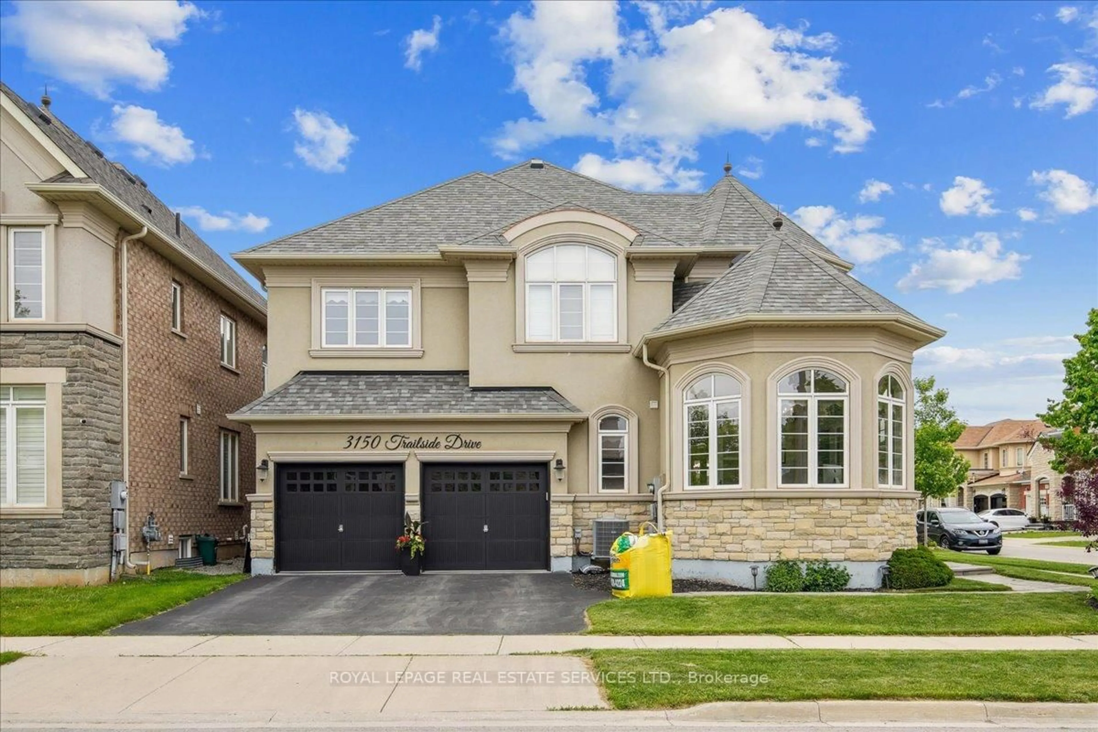 Home with brick exterior material, street for 3150 Trailside Dr, Oakville Ontario L6M 0P6