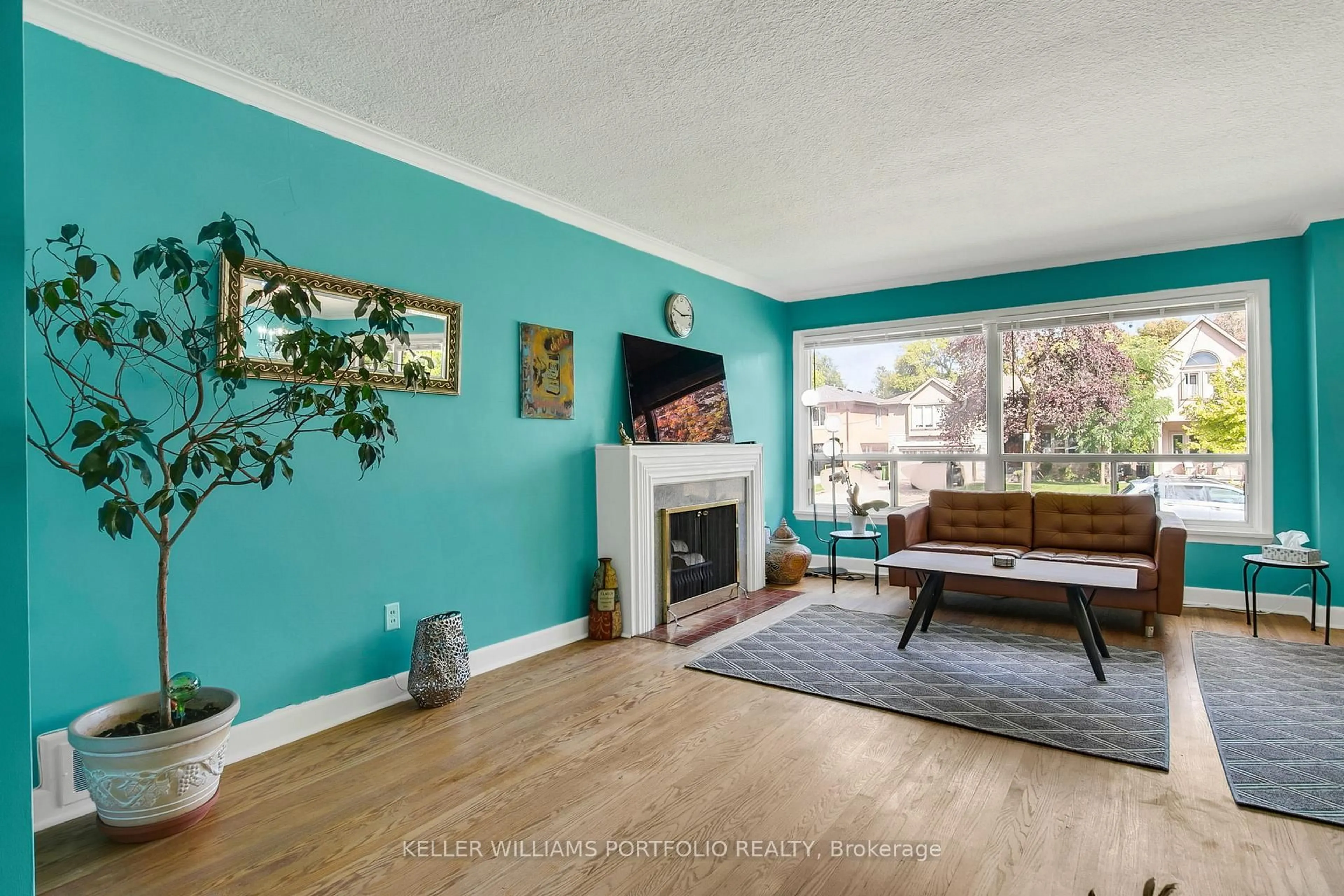 Living room with furniture, wood/laminate floor for 106 Botfield Ave, Toronto Ontario M9B 4E5