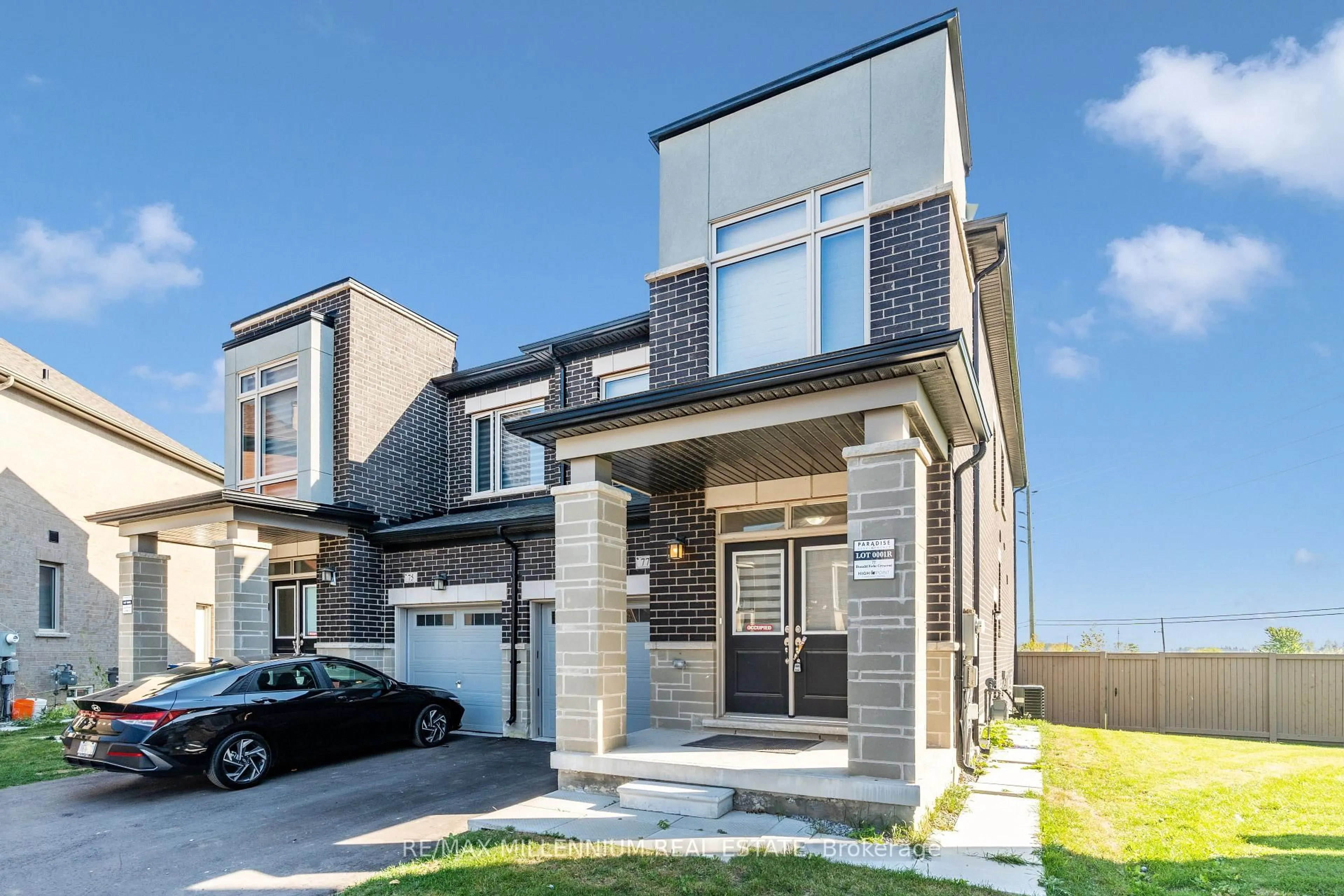 Home with brick exterior material, street for 77 Donald Ficht Cres, Brampton Ontario L7A 5H6