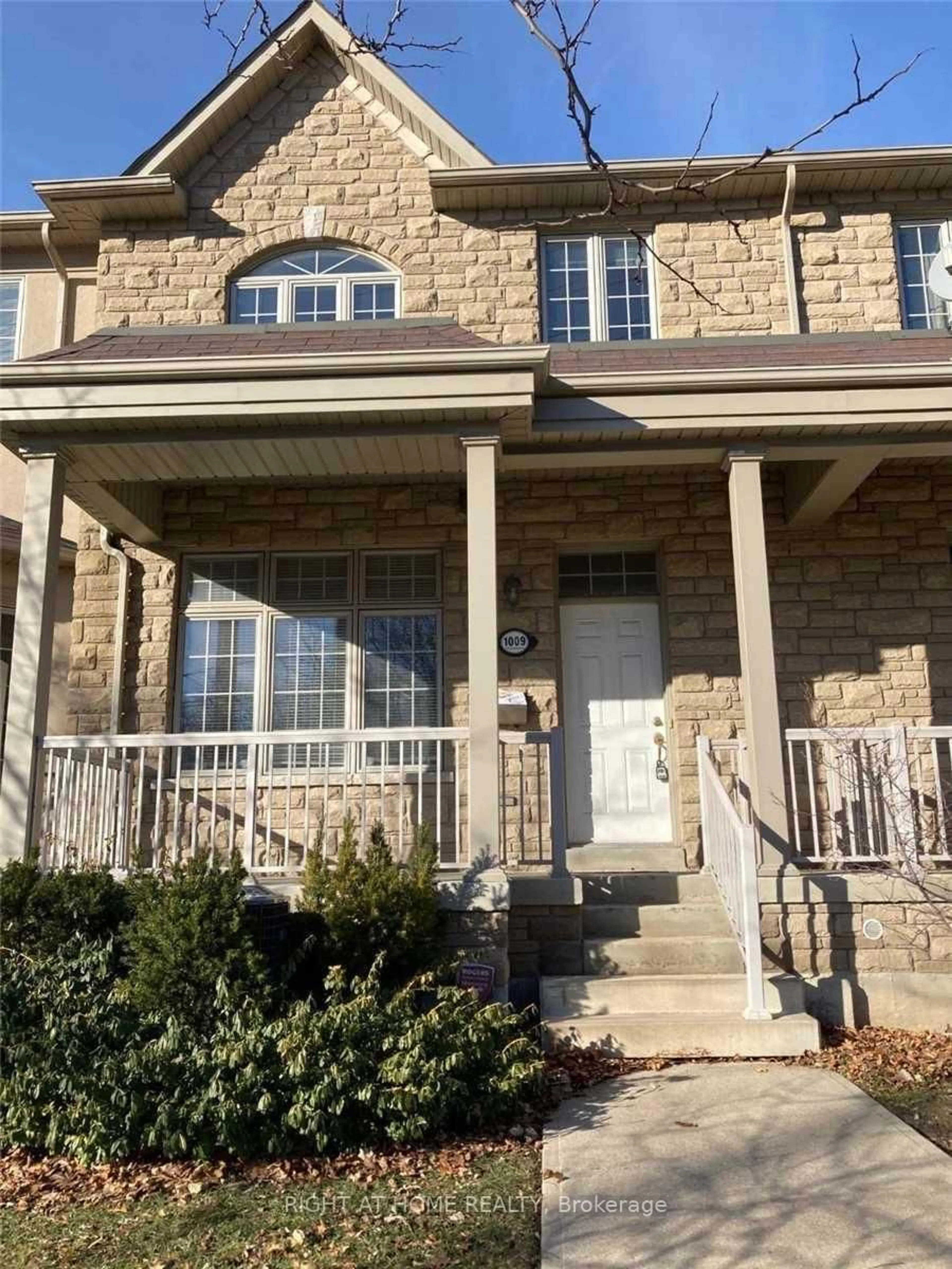Home with brick exterior material, street for 1009 Lorne Park Rd #2, Mississauga Ontario L5H 2Z9
