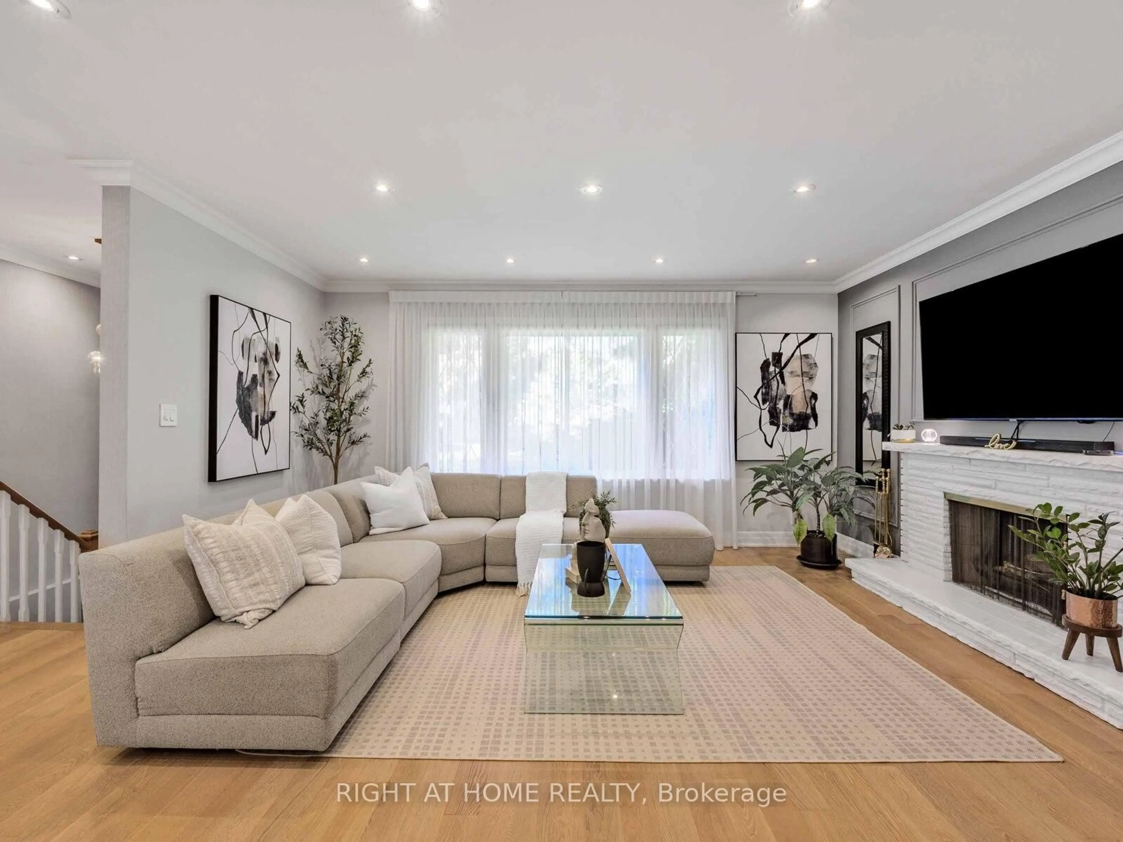 Living room with furniture, wood/laminate floor for 7 Bloorlea Cres, Toronto Ontario M9B 1P2