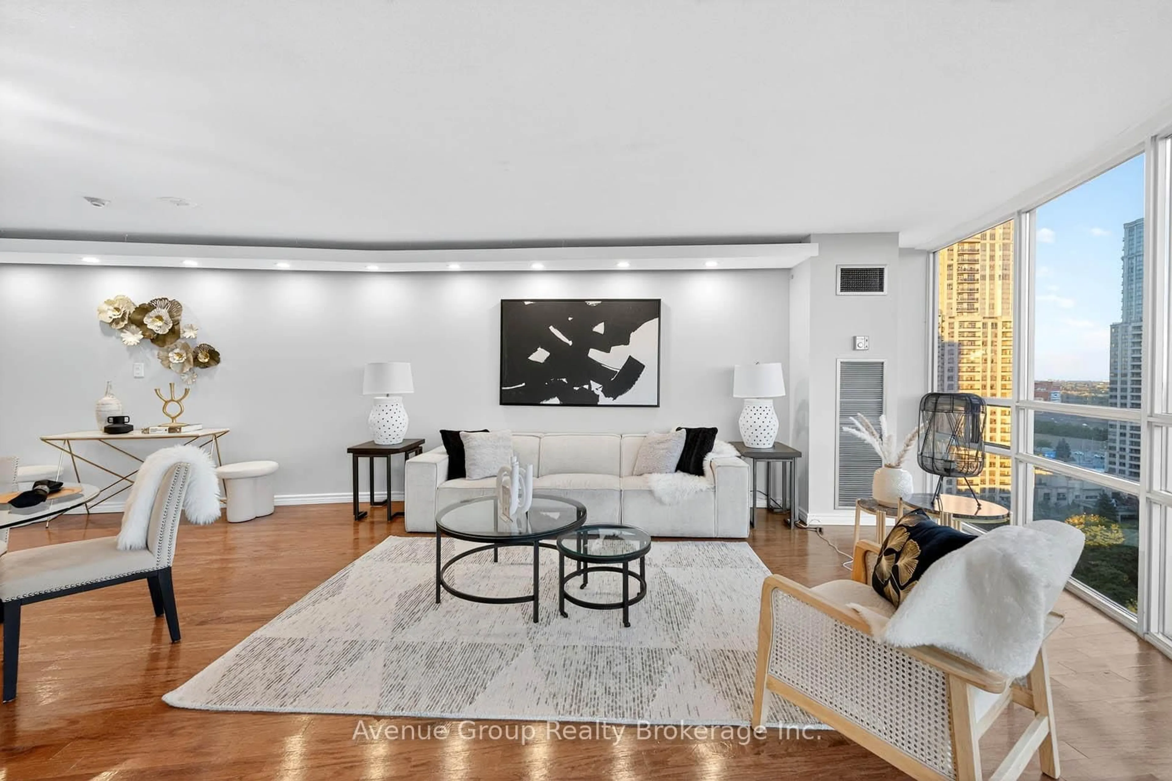 Living room with furniture, unknown for 50 Eglinton Ave #1807, Mississauga Ontario L5R 3P5