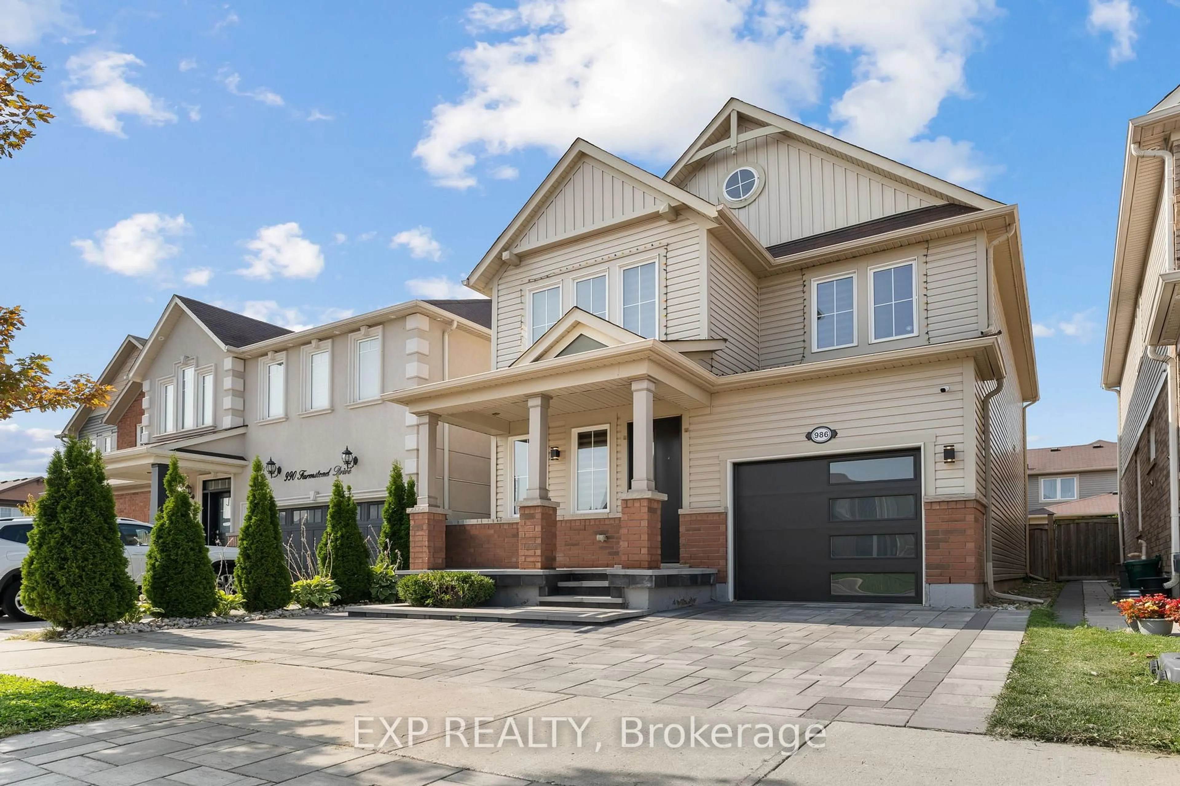 Home with brick exterior material, street for 986 Farmstead Dr, Milton Ontario L9T 8J1