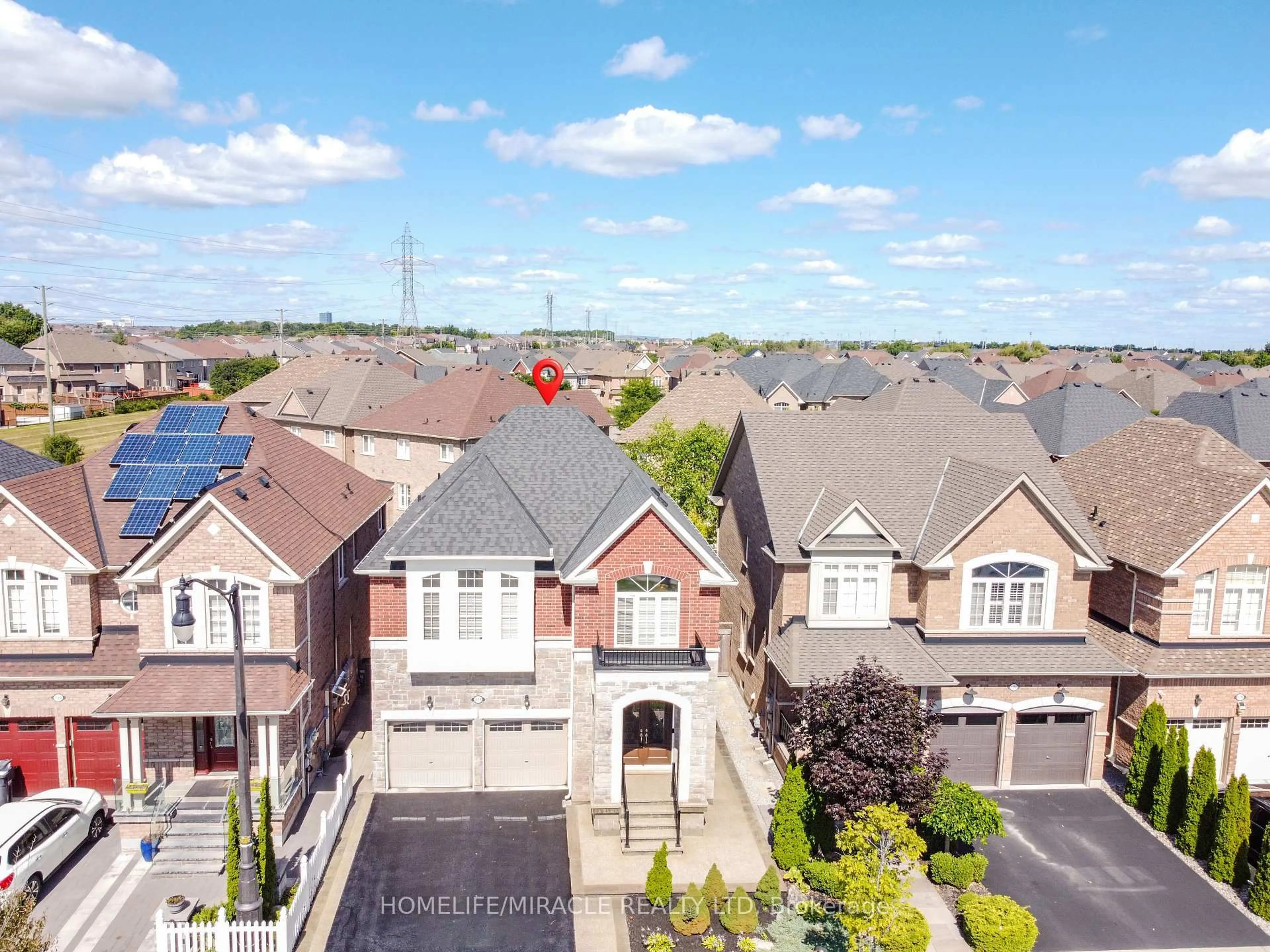 A pic from outside/outdoor area/front of a property/back of a property/a pic from drone, street for 122 Bonnie Braes Dr, Brampton Ontario L6Y 0W7