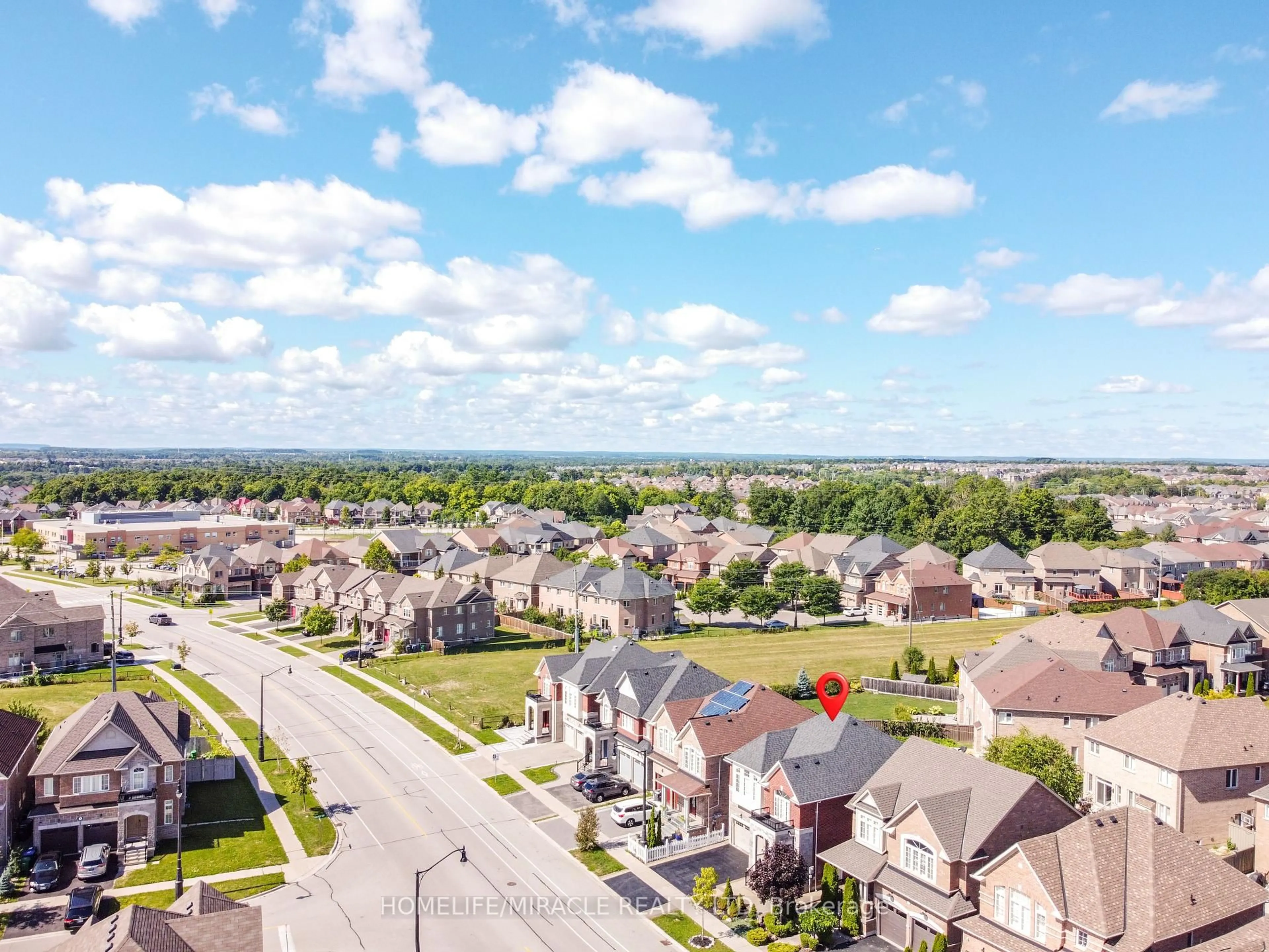 A pic from outside/outdoor area/front of a property/back of a property/a pic from drone, street for 122 Bonnie Braes Dr, Brampton Ontario L6Y 0W7
