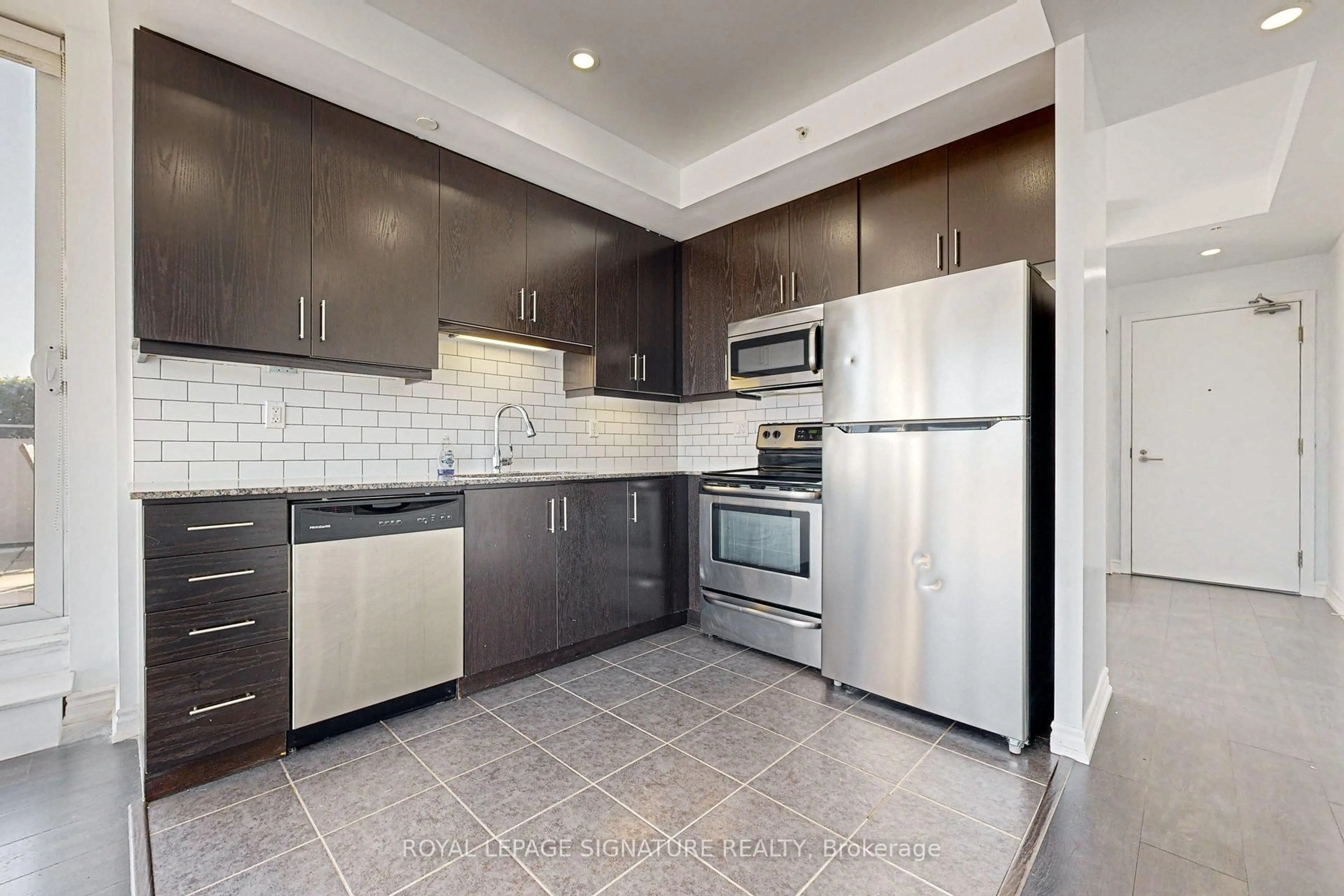 Standard kitchen, ceramic/tile floor for 15 James Finlay Way #1012, Toronto Ontario M3M 0B3