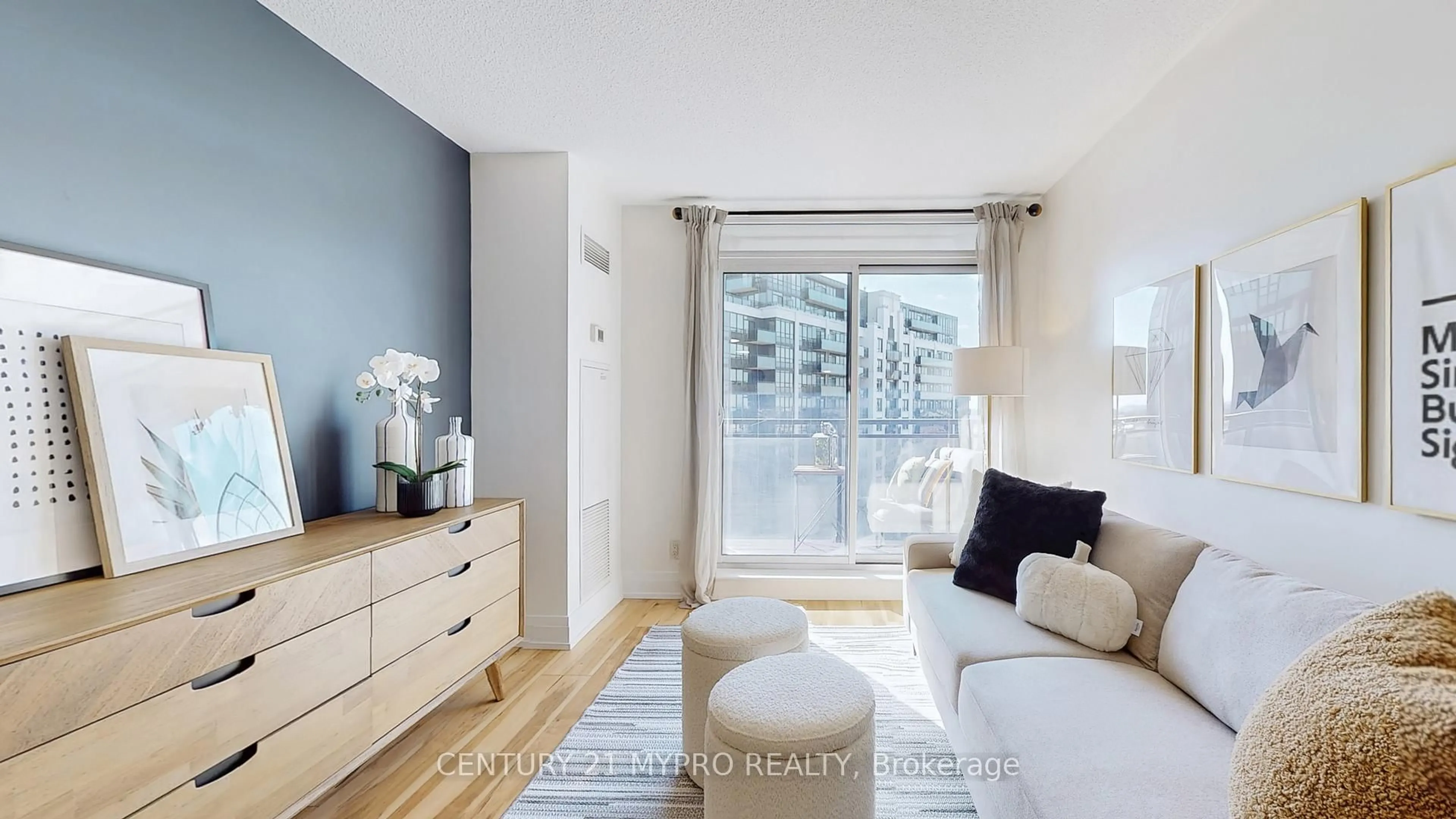 Living room with furniture, wood/laminate floor for 1060 Sheppard Ave #1103, Toronto Ontario M3J 0G7