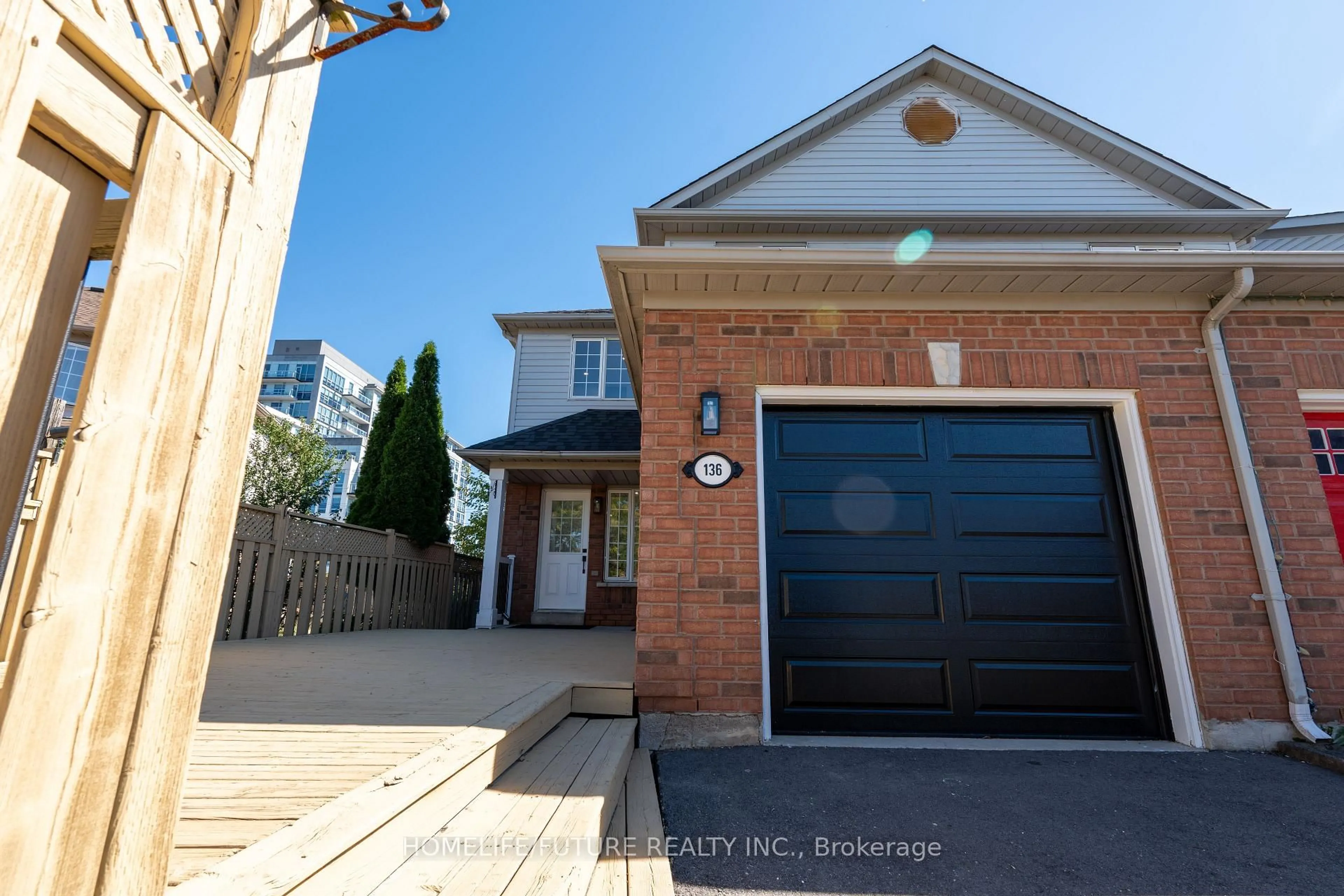 Home with brick exterior material, street for 136 Manley Lane, Milton Ontario L9T 5N9