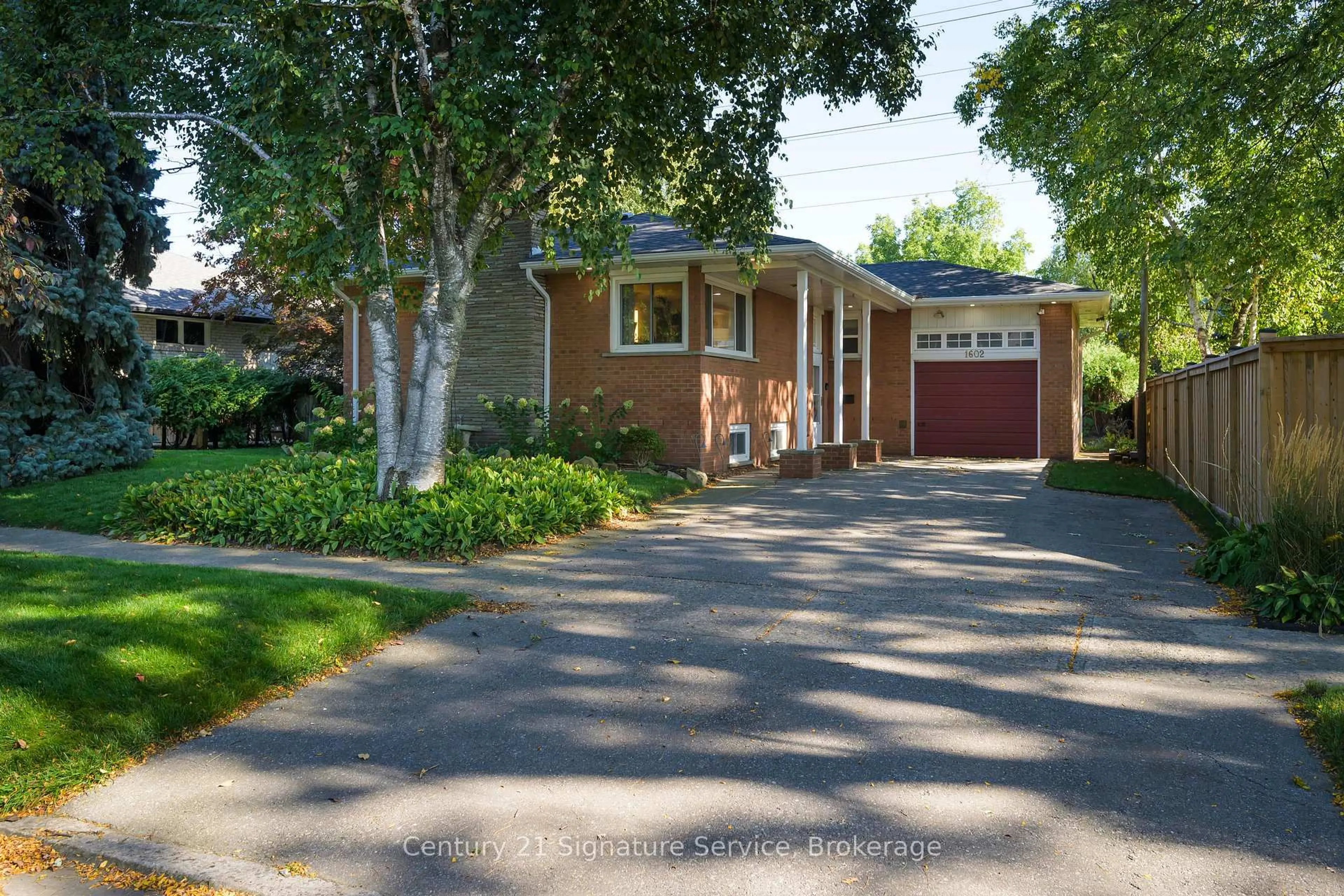 Home with brick exterior material, street for 1602 Carletta Dr, Mississauga Ontario L4X 1E5