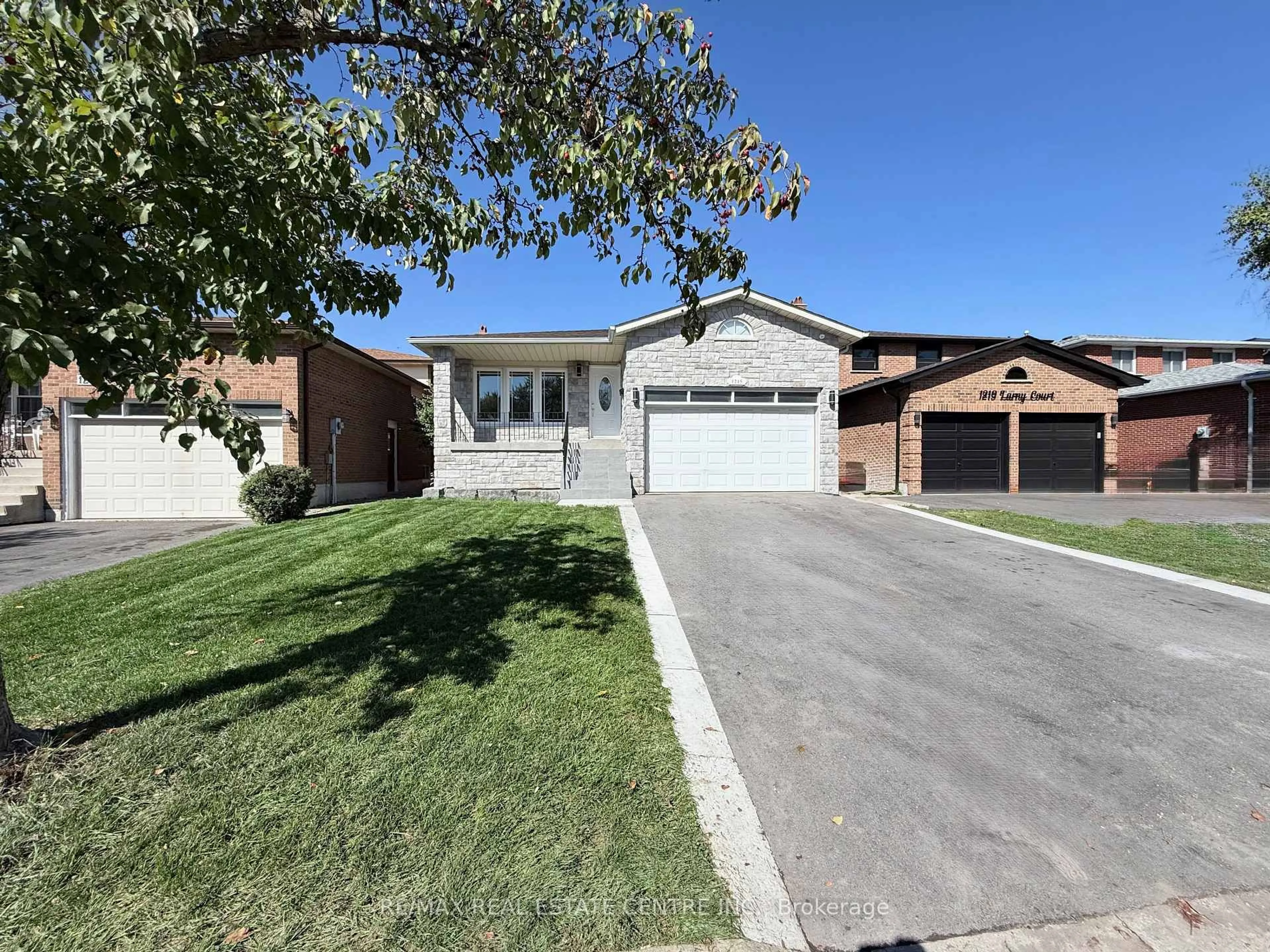Home with brick exterior material, street for 1215 Larny Crt, Mississauga Ontario L4W 3N4