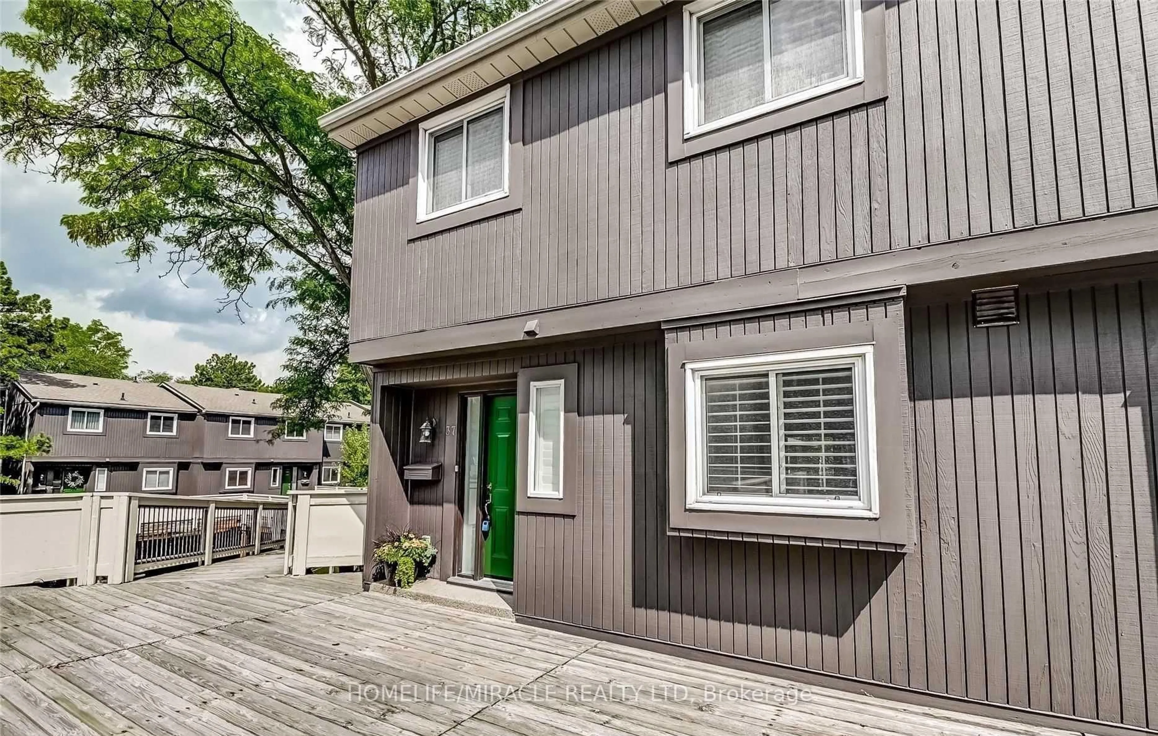 Home with vinyl exterior material, street for 6855 Glen Erin Dr #37, Mississauga Ontario L5N 1P6