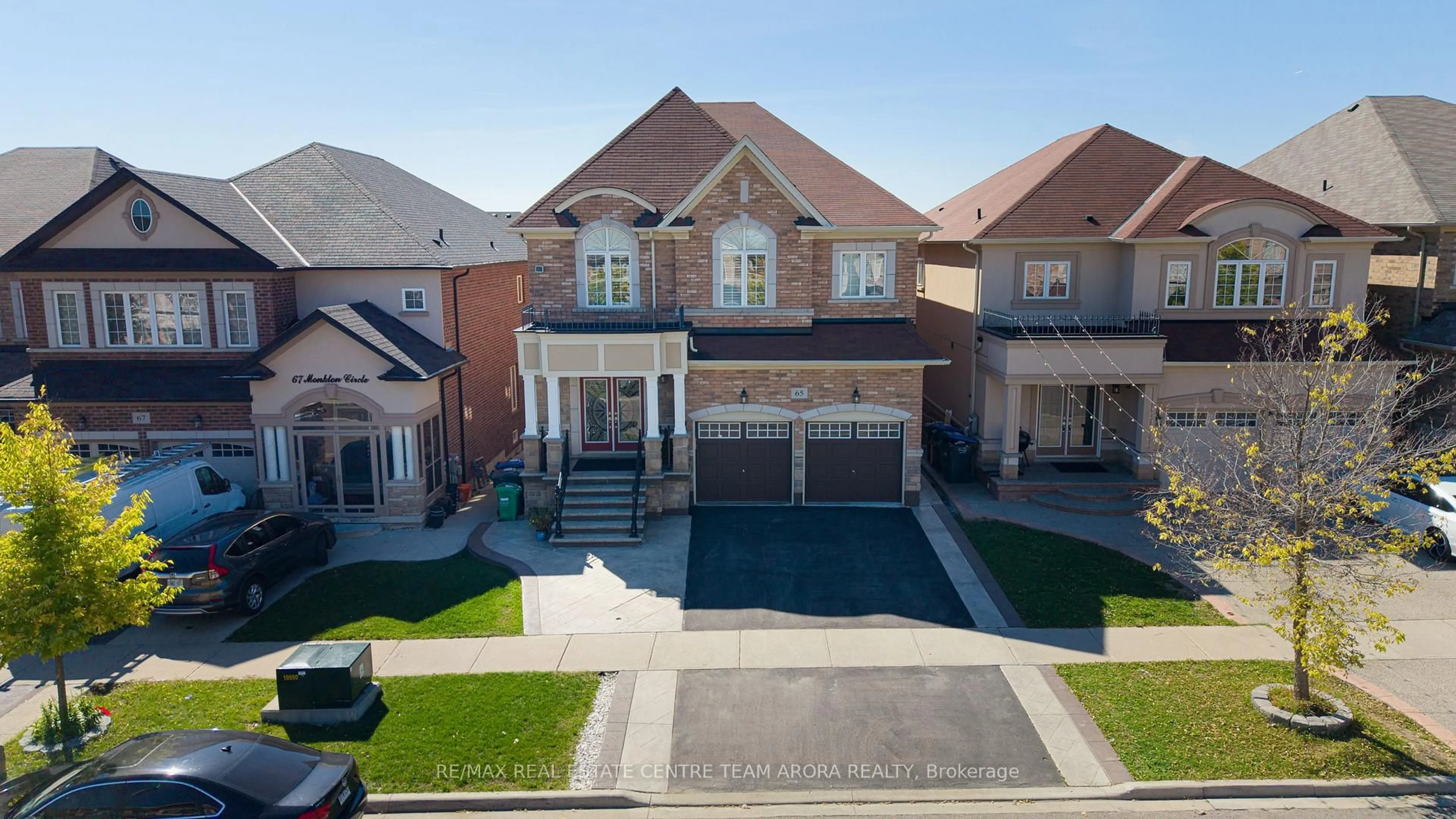 A pic from outside/outdoor area/front of a property/back of a property/a pic from drone, street for 65 Monkton Circ, Brampton Ontario L6Y 5Z5