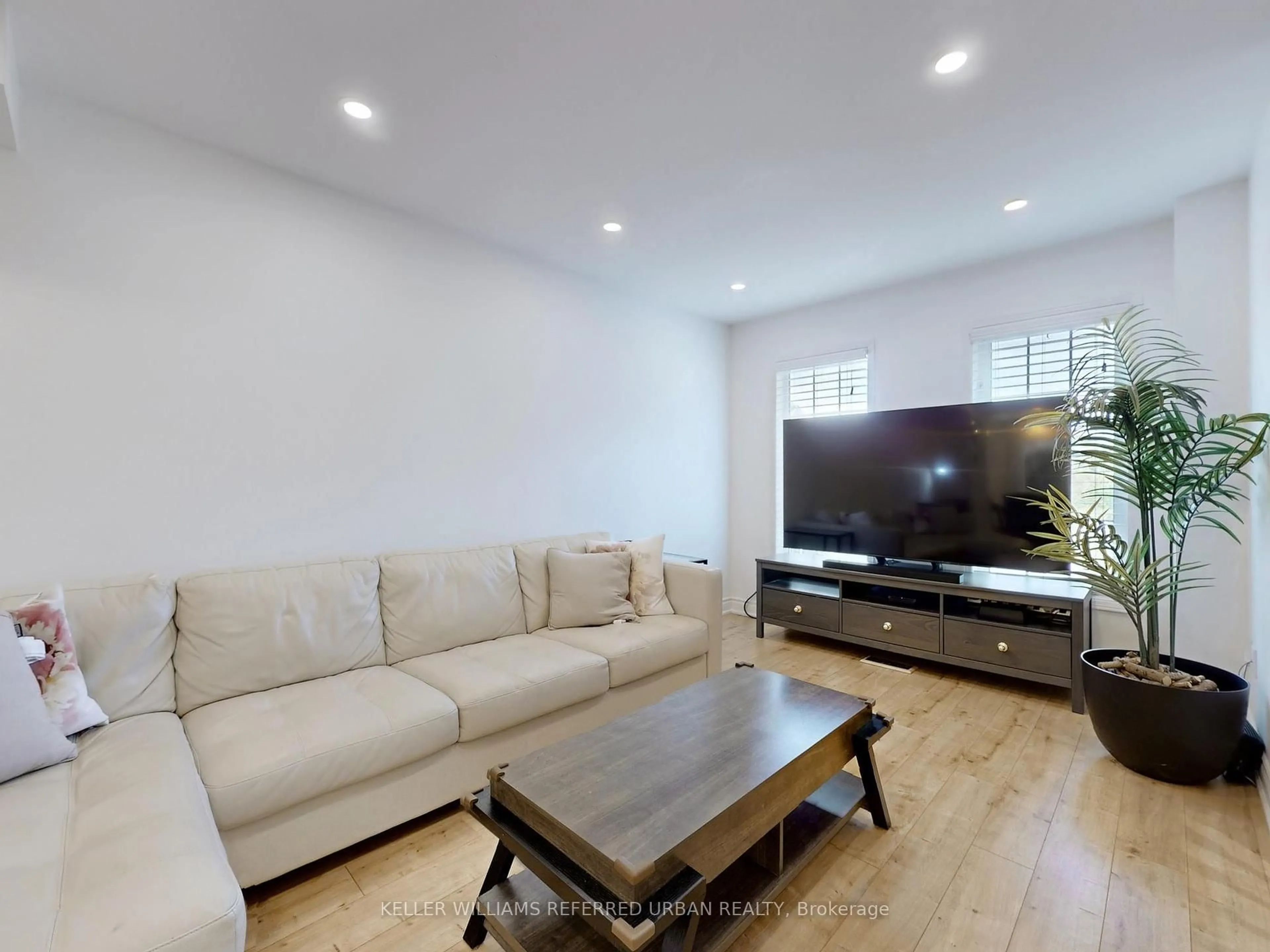 Living room with furniture, wood/laminate floor for 1480 Britannia Rd #50, Mississauga Ontario L5V 2K4