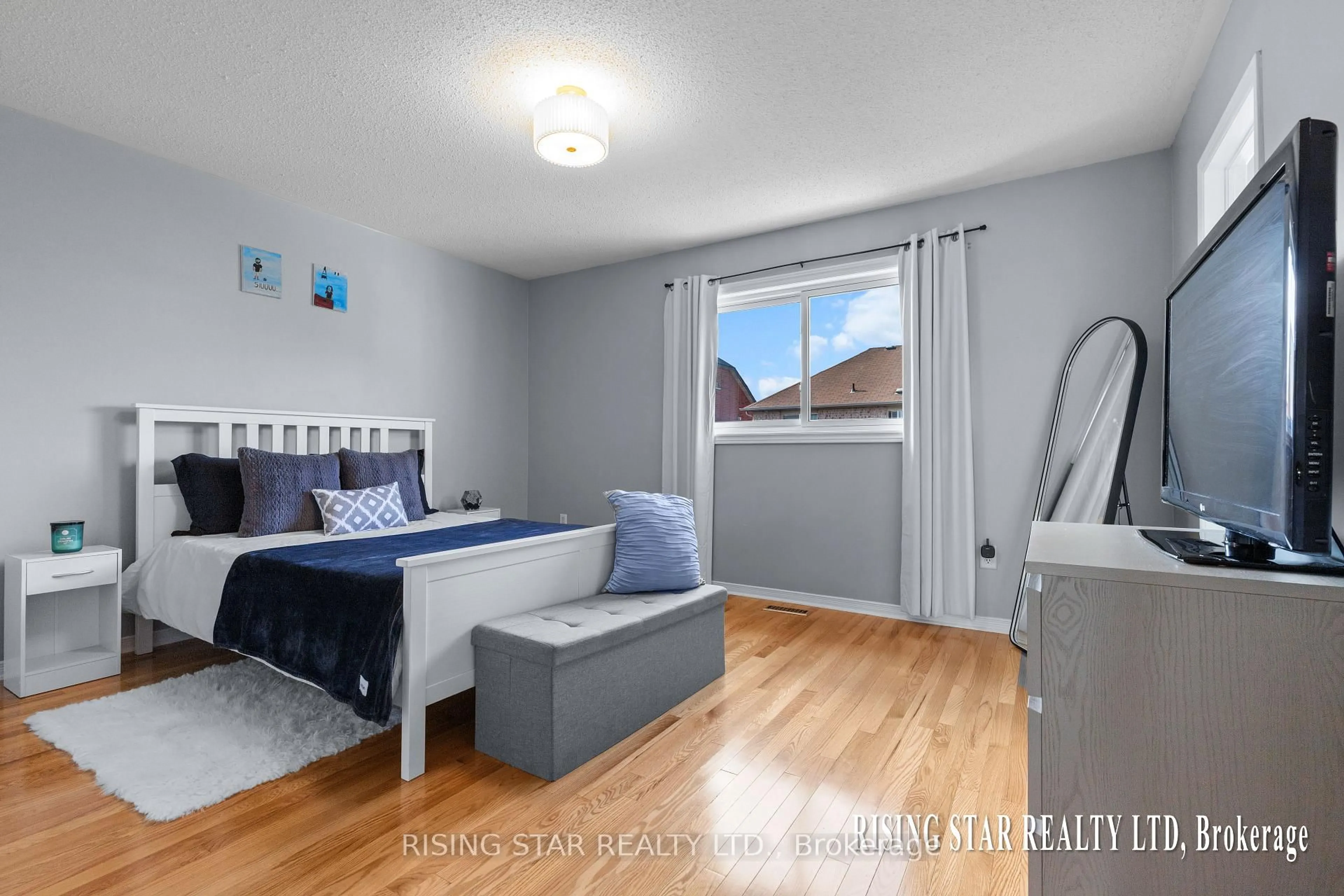 Bedroom with bed, wood/laminate floor for 20 Arid Ave, Brampton Ontario L6R 1P9
