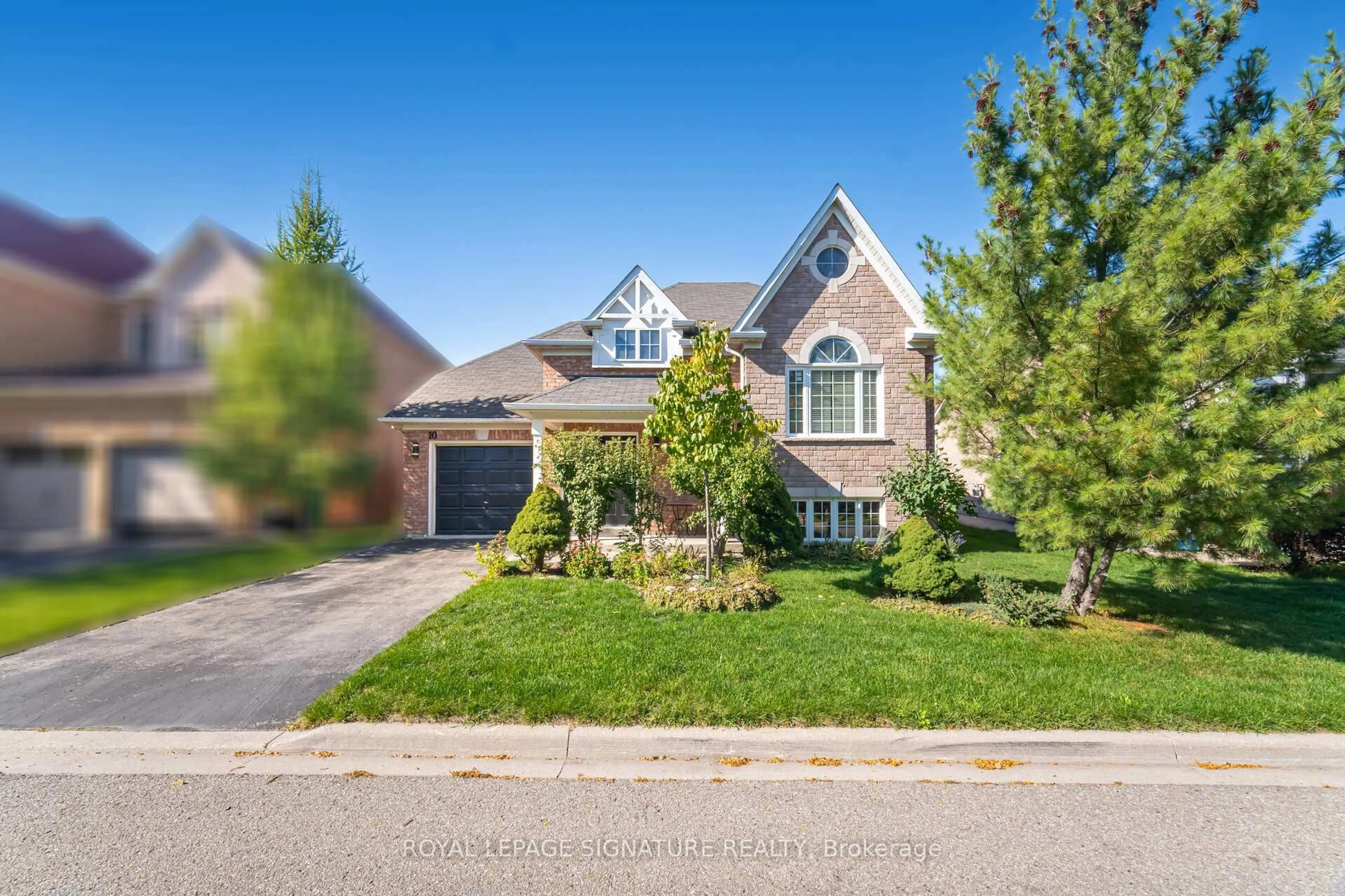 Home with brick exterior material, street for 10 Banks Dr, Brampton Ontario L6P 1C7